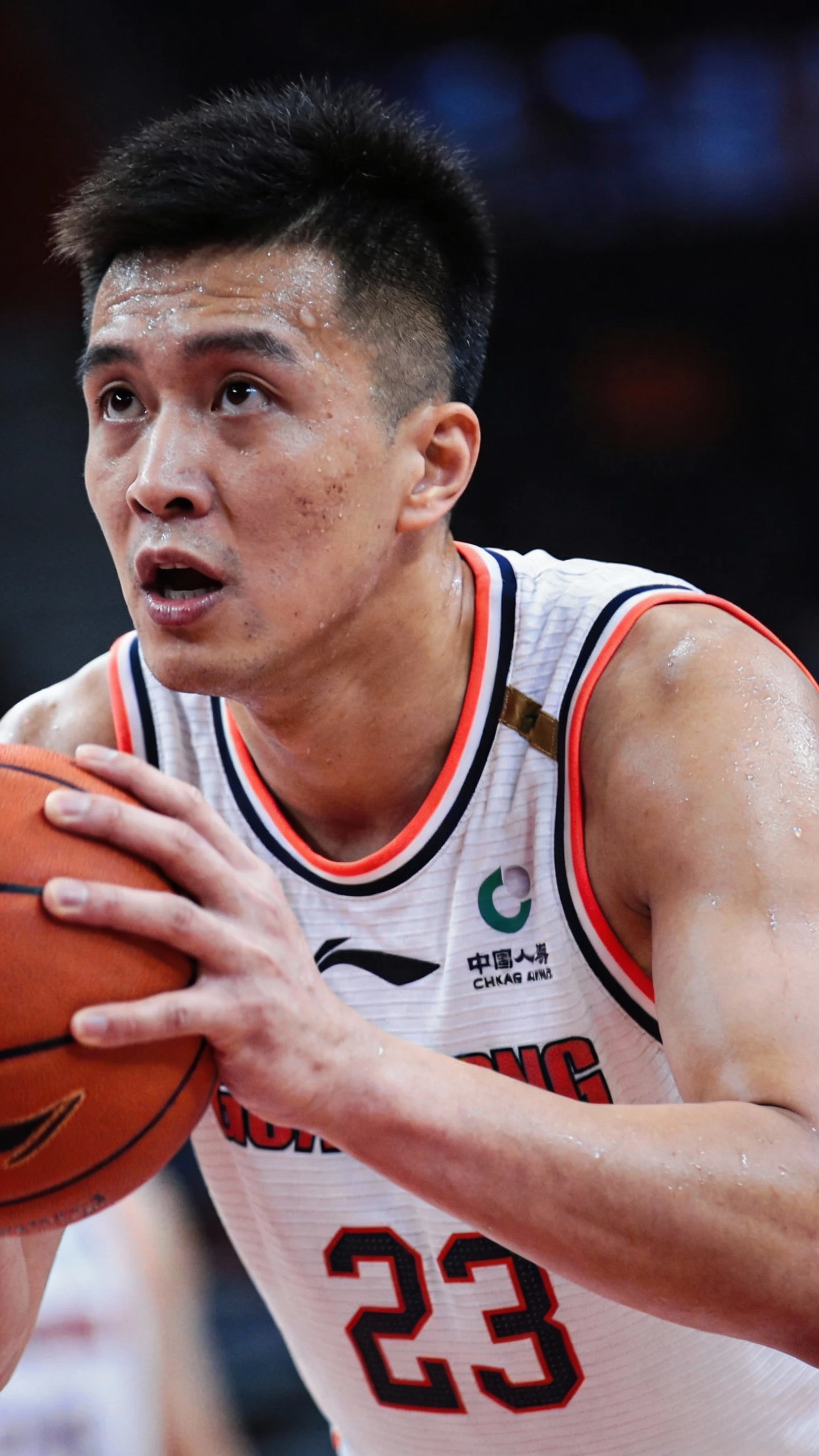 Male Basketball Player Holding Basketball