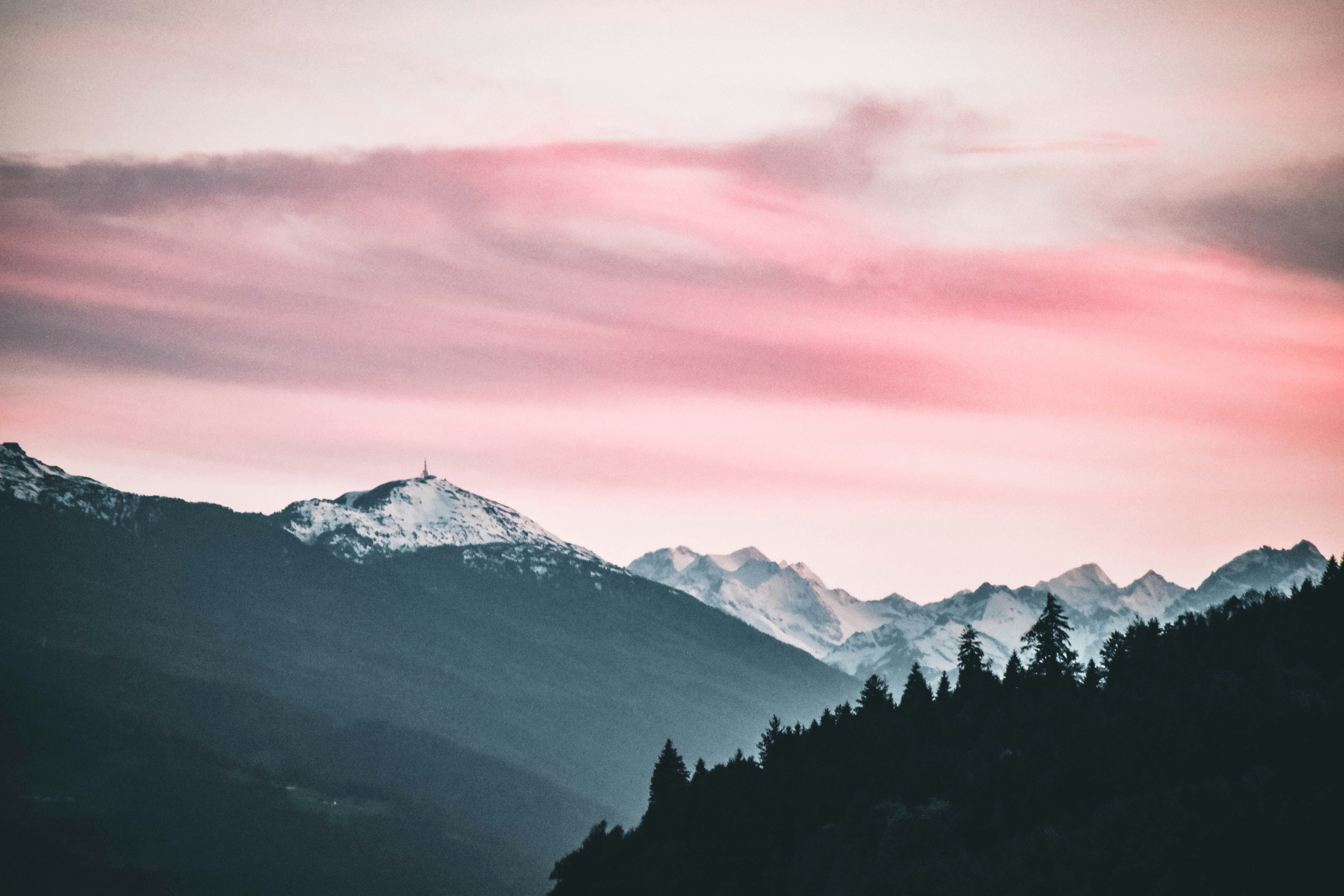 Pink Sky Over Snowy Mountains