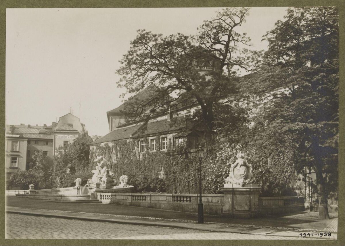Vintage Street View with Fountain and Historic Building
