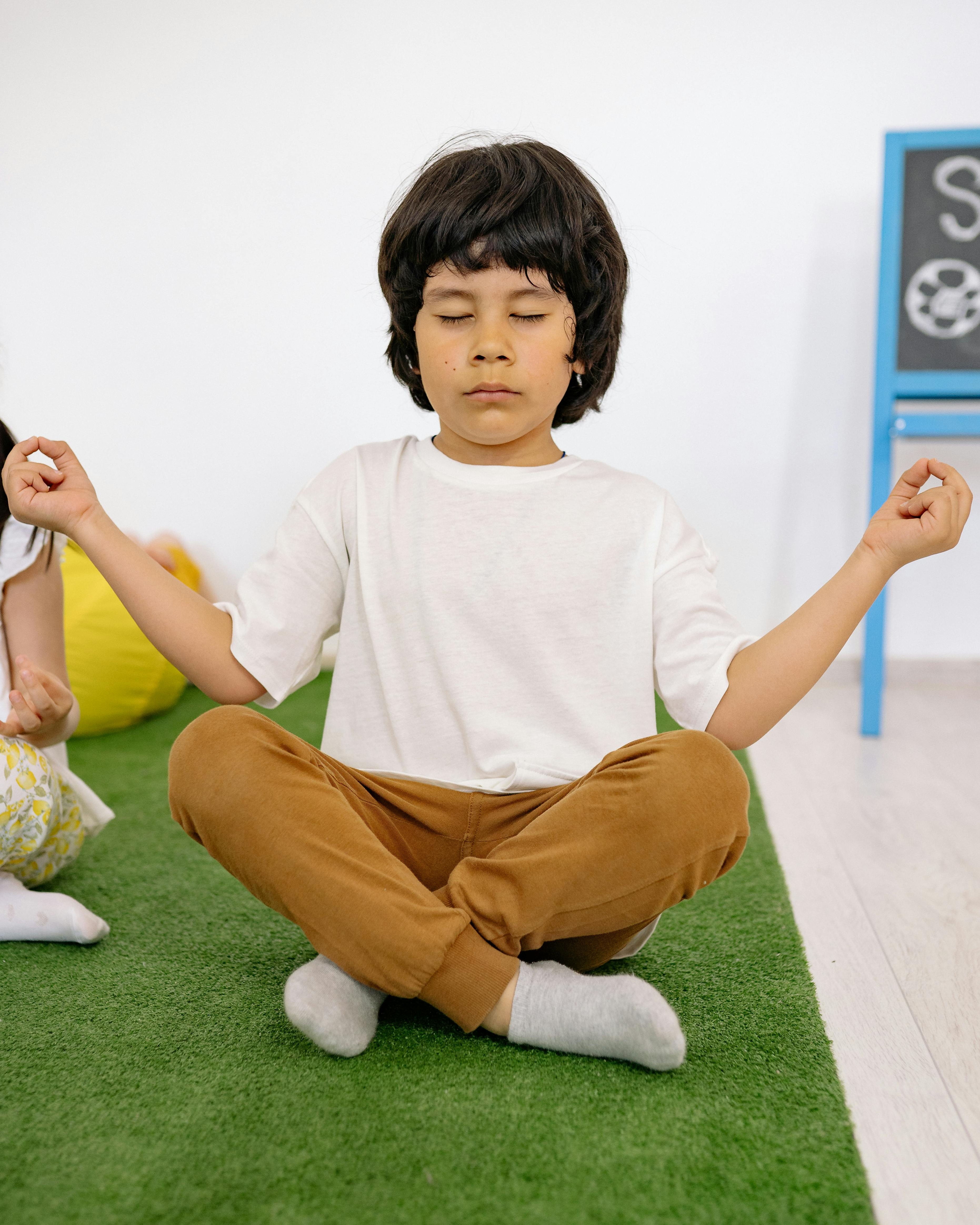 Young Boy Practicing Meditation
