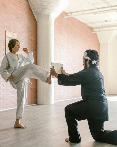 Karate Student Practicing Board Break