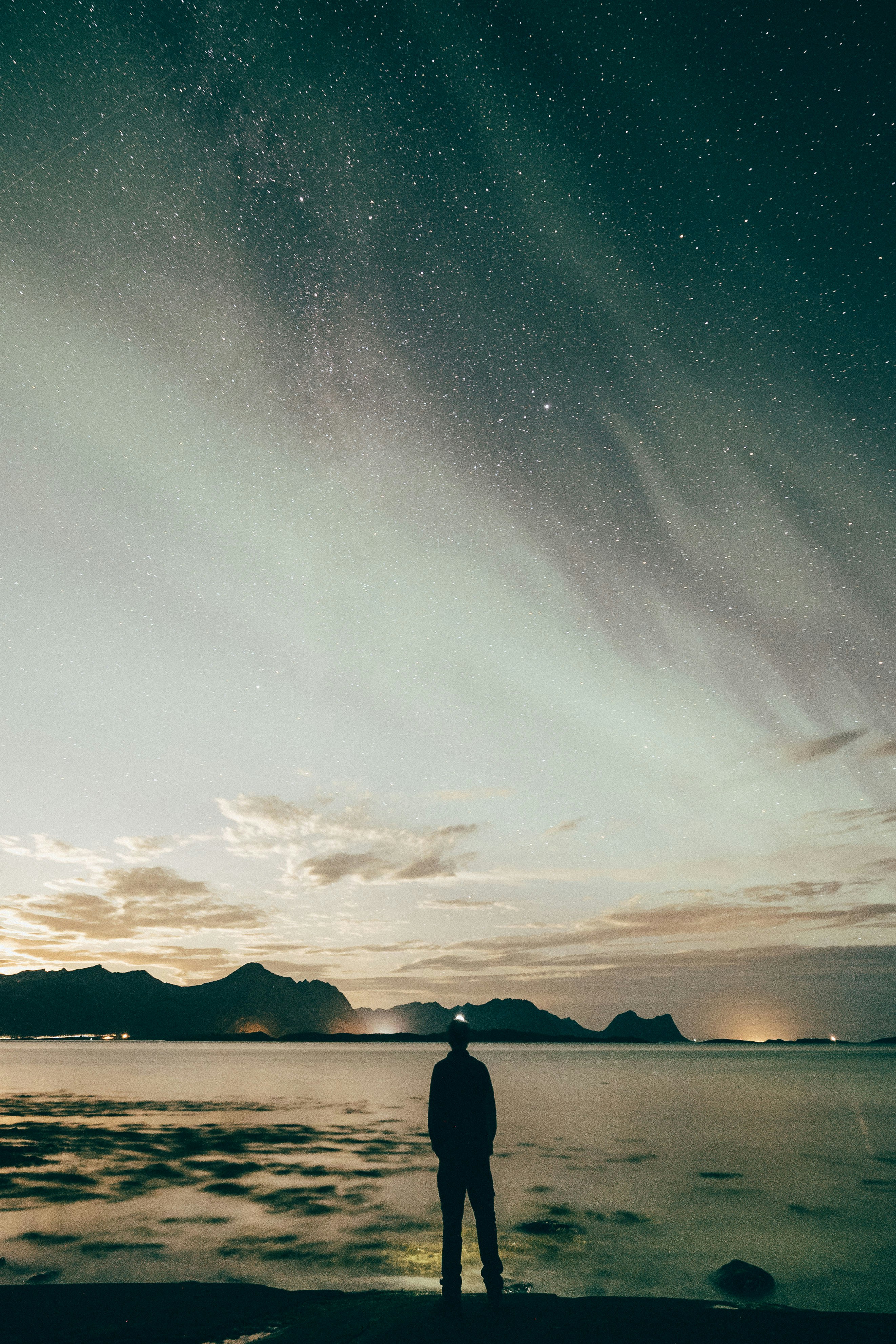 Man Watching Starry Night By Sea