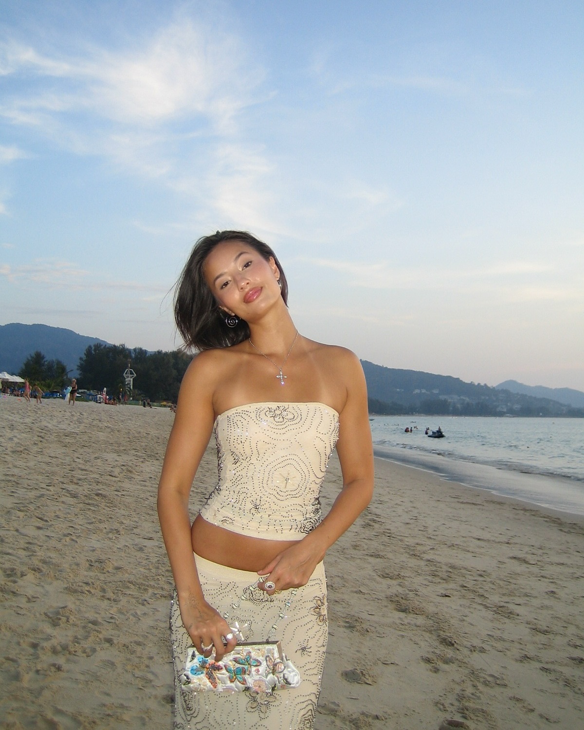 Woman Posing on Sandy Beach