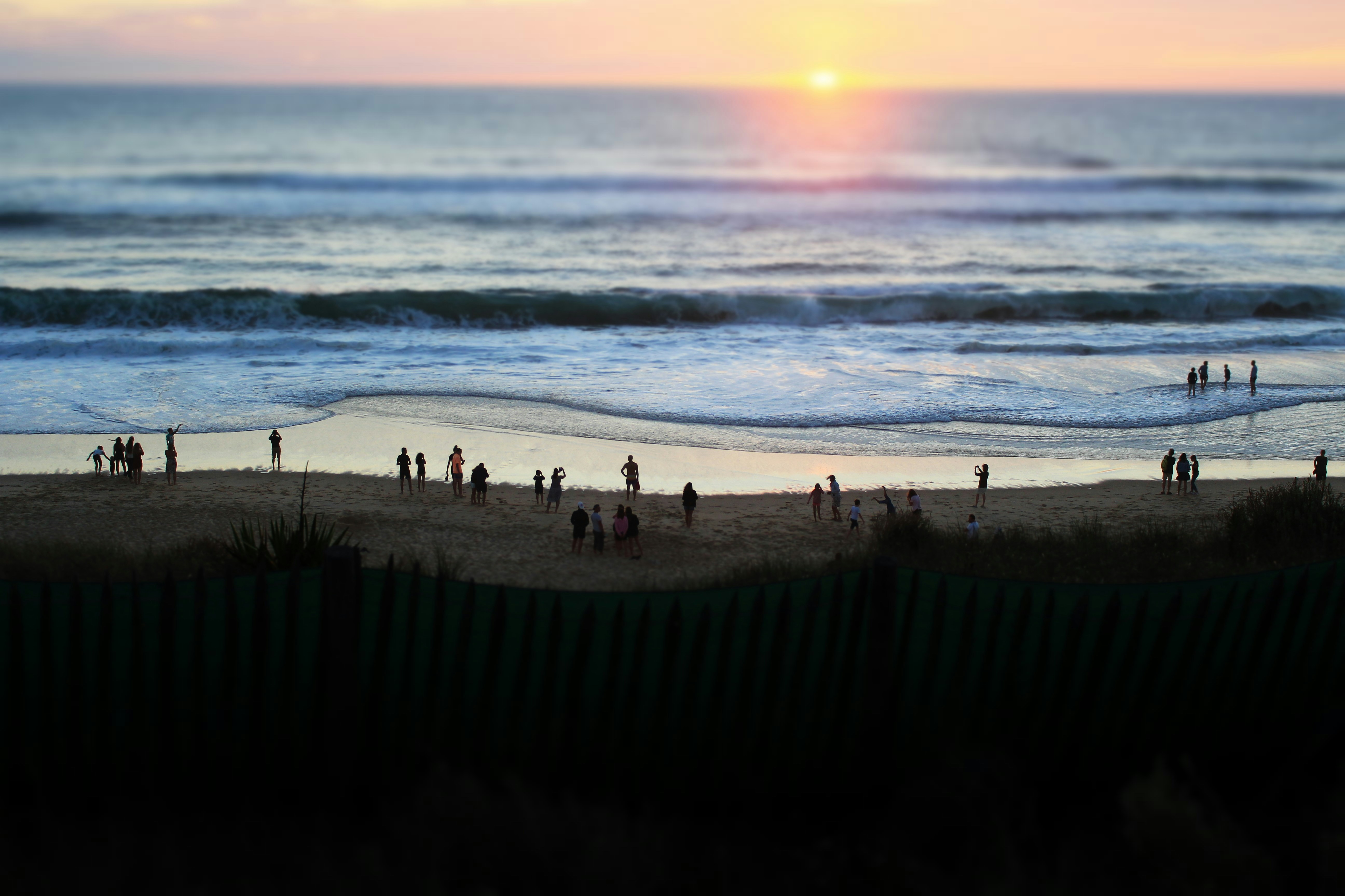 Crowded Beach at Sunset
