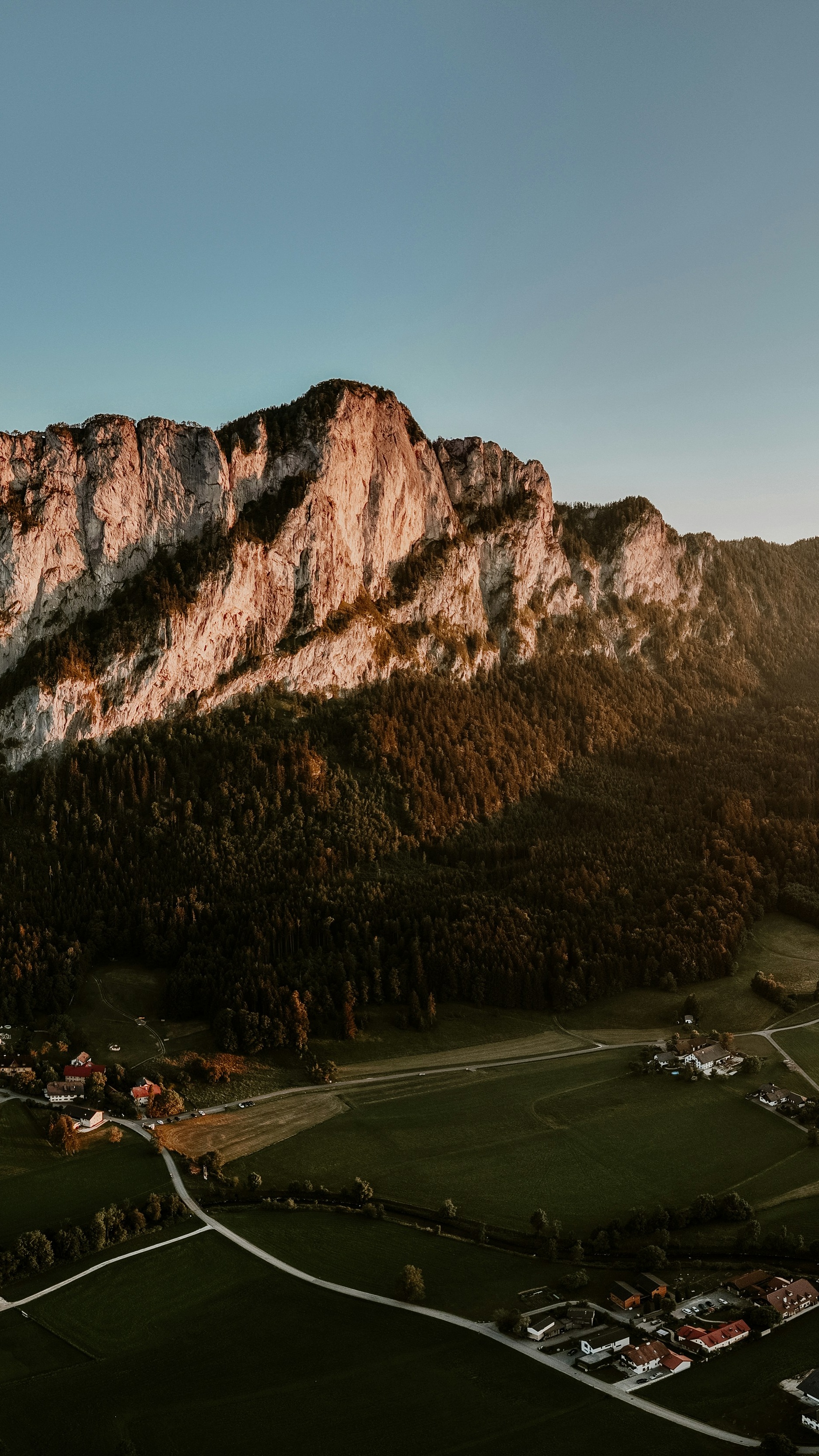 Sunlit Mountain Cliff above Valley Village