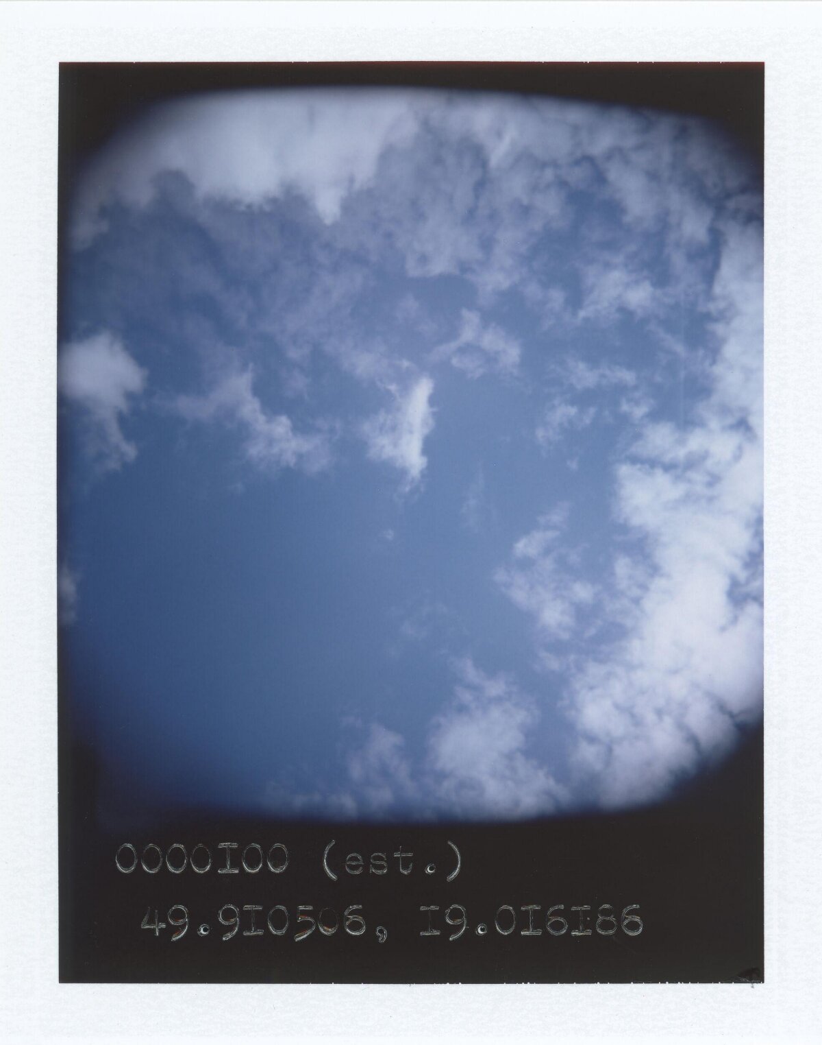 Polaroid Shot of Blue Sky and Clouds