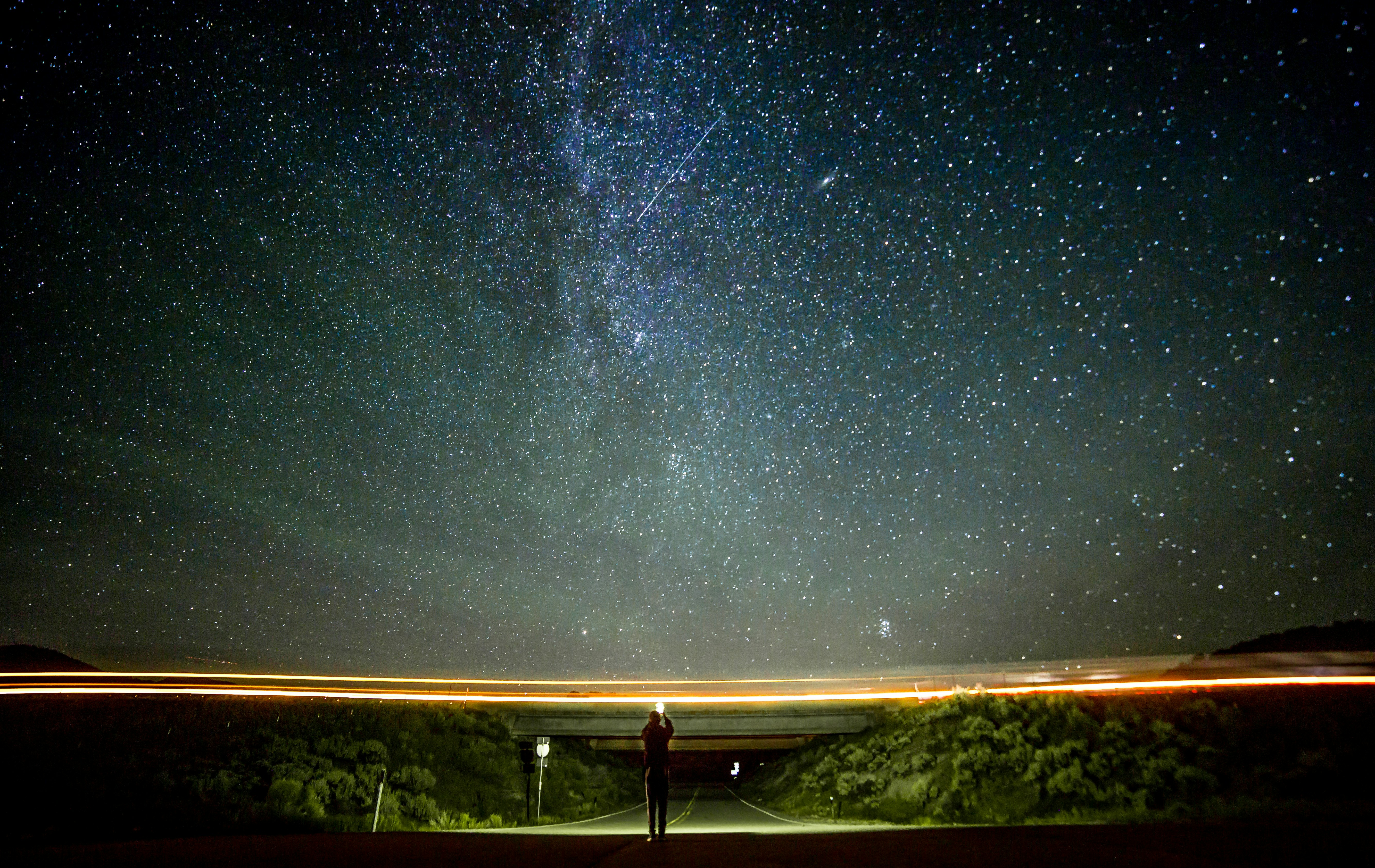 Person Gazing At Starry Night Sky