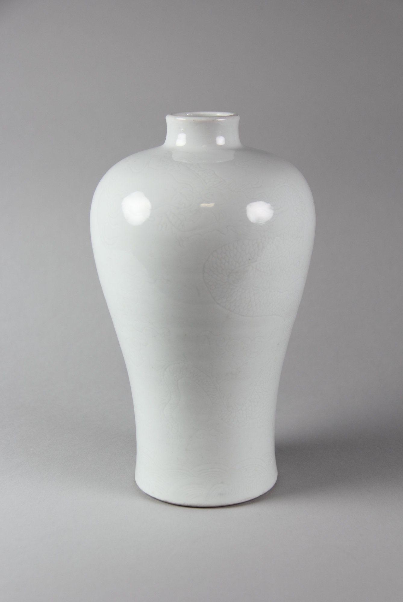 White Glazed Carved Dragon Meiping Vase