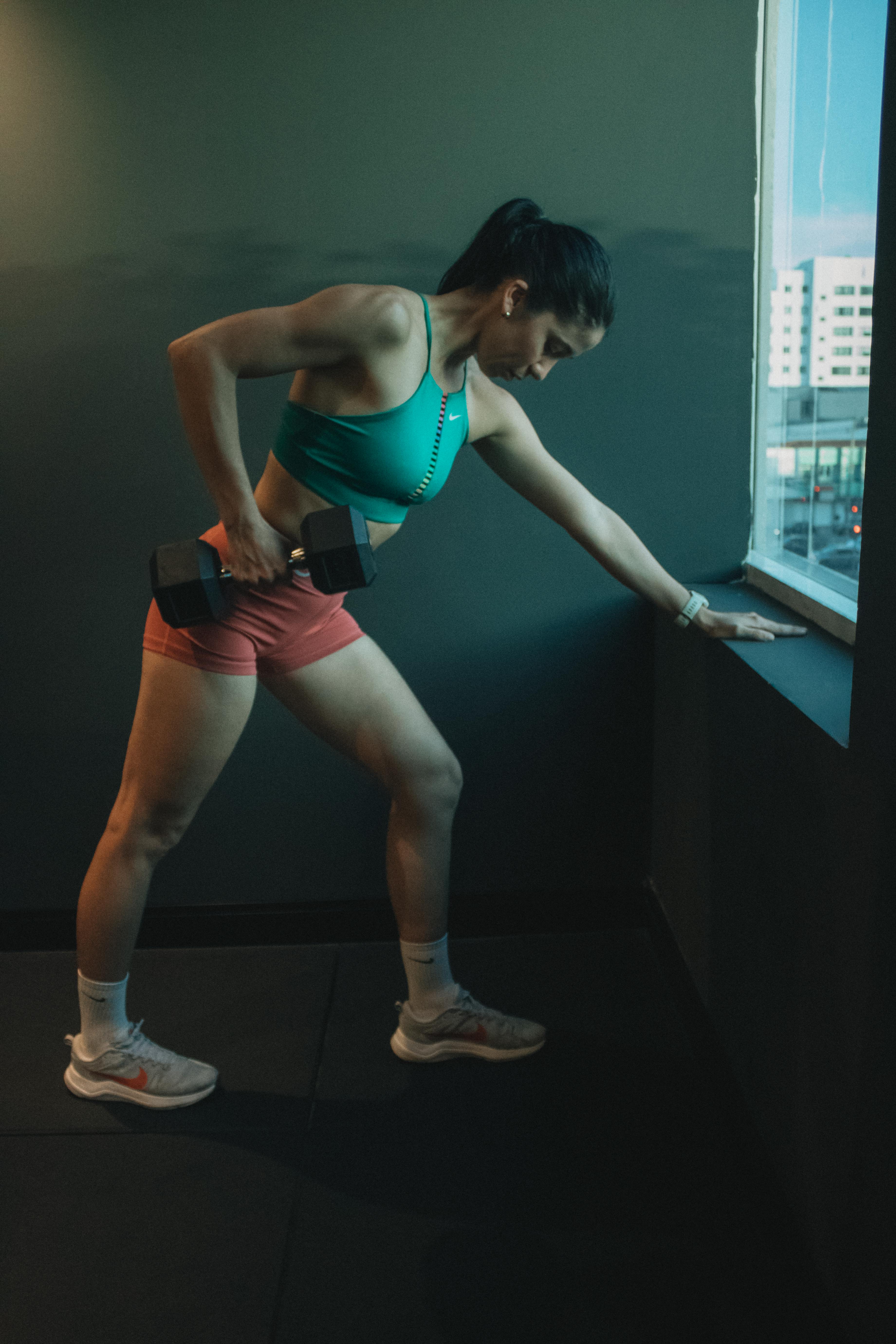Woman Doing Dumbbell Workout