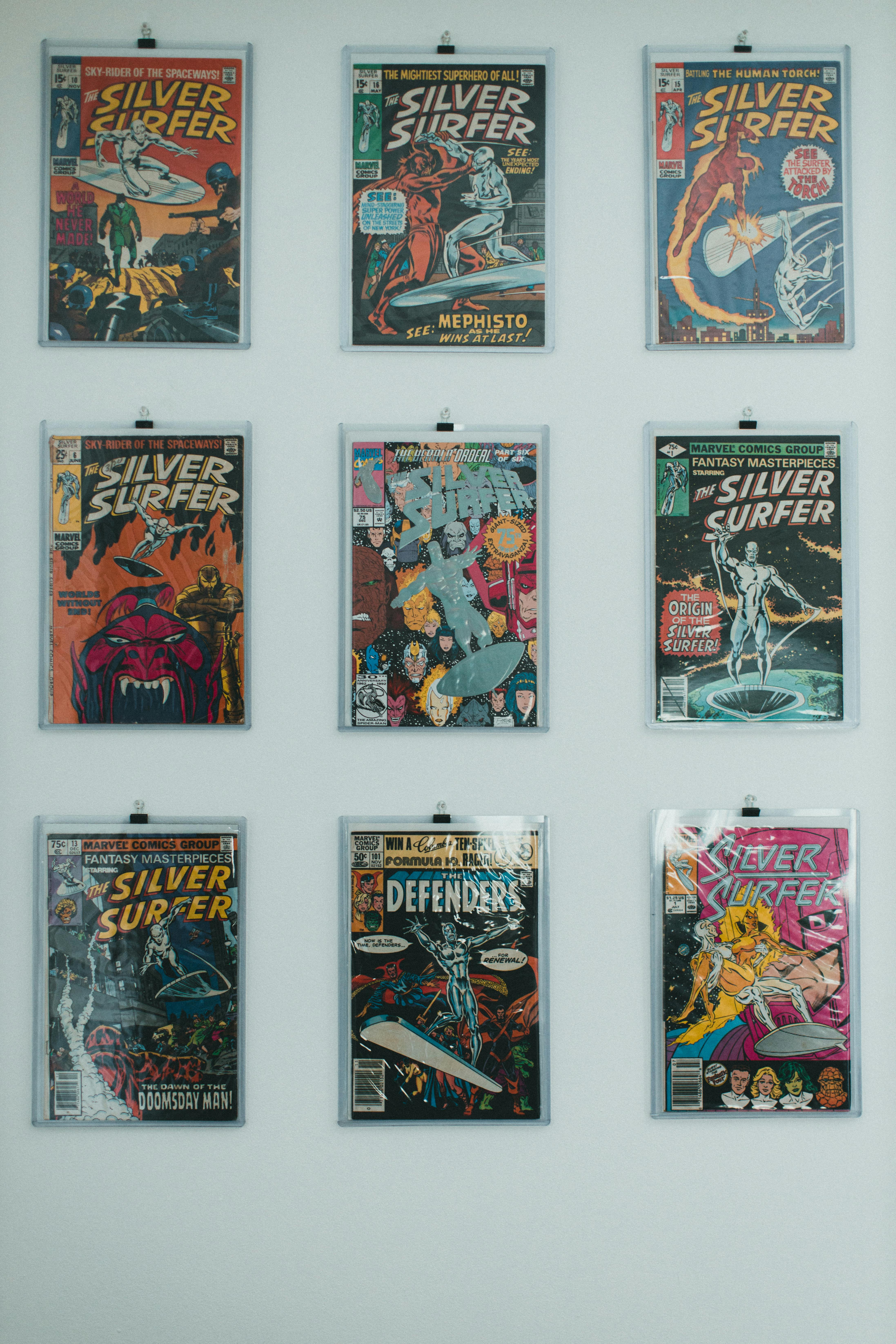 Silver Surfer Comic Covers on White Wall