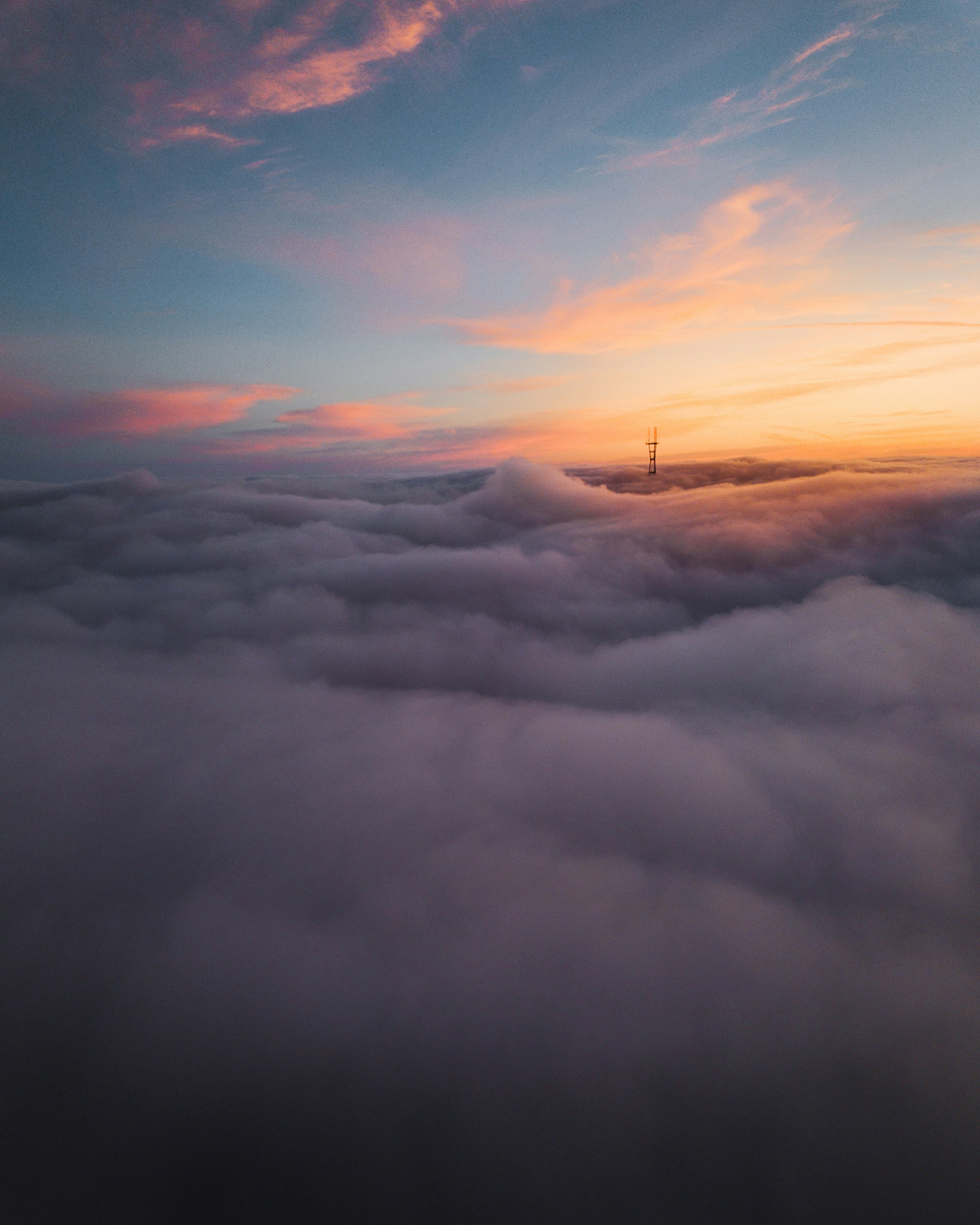 Tower Above Cloud Sea at Sunset