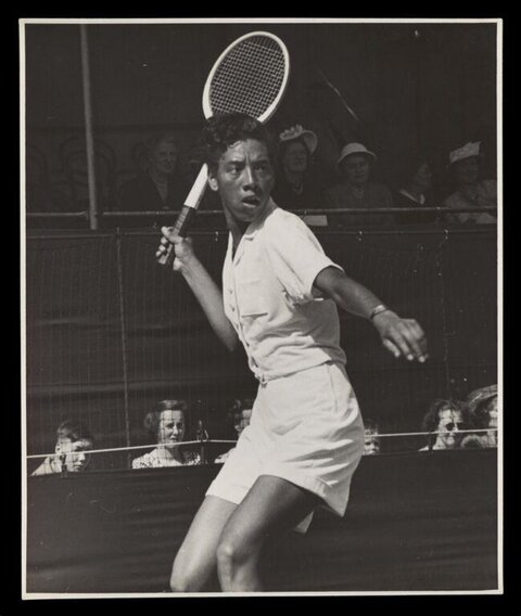 Female Tennis Player Mid Match Action