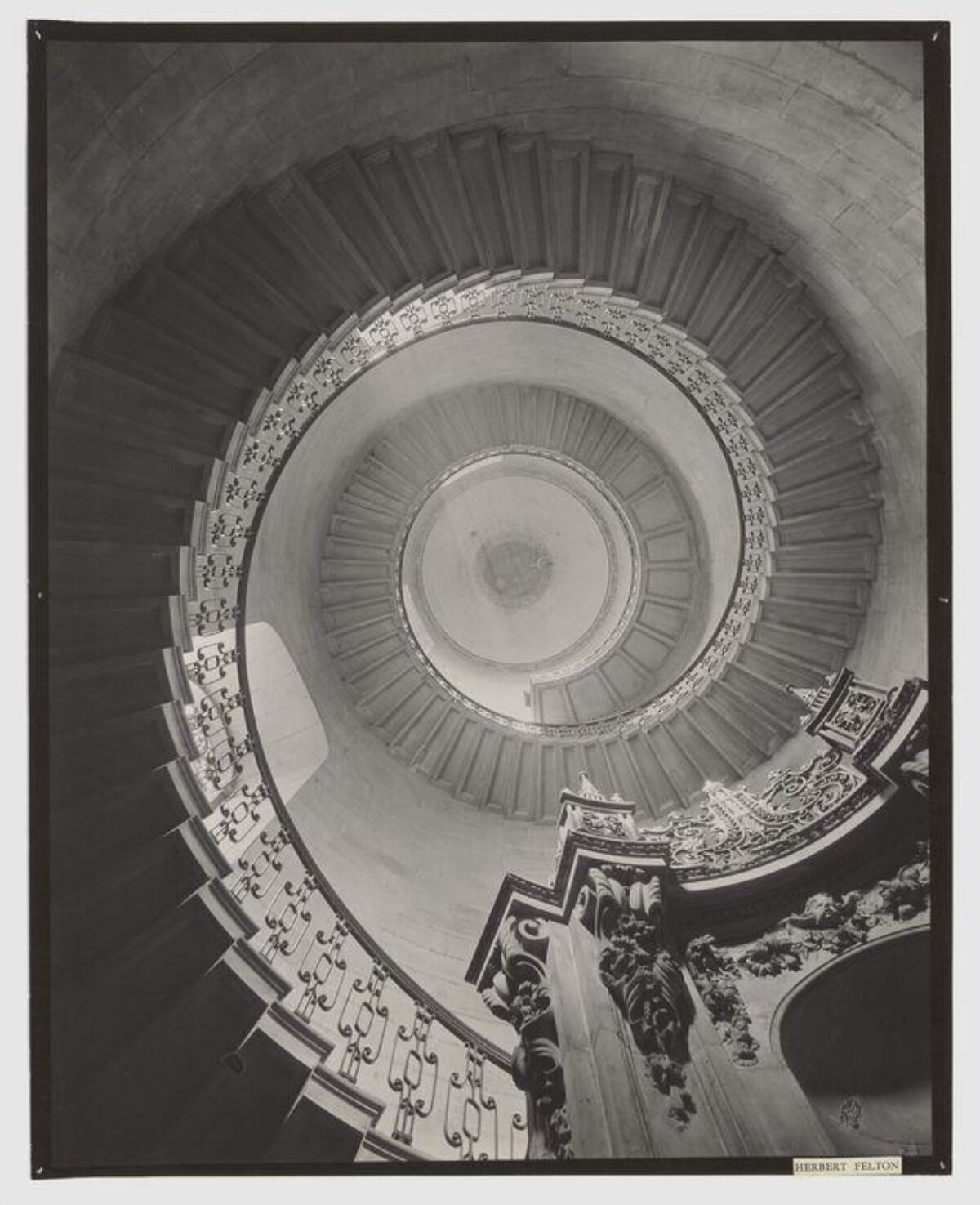 Looking Up at Ornate Spiral Staircase