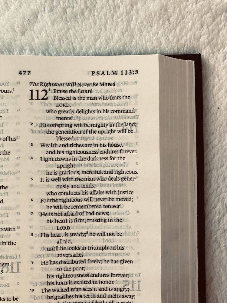 Open Bible Page Showing Psalm 112