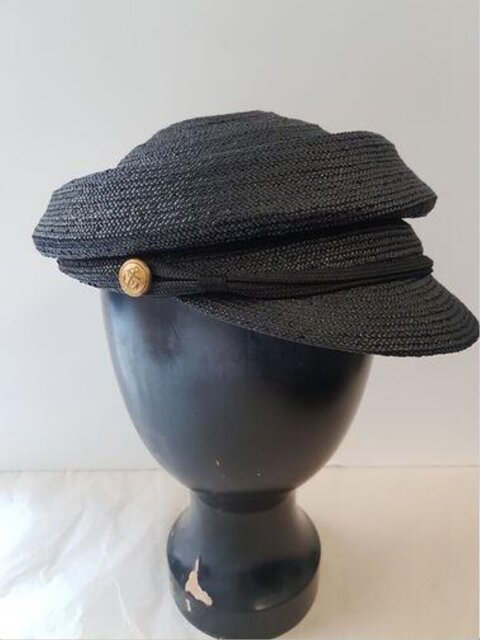 Black Woven Newsboy Cap on Mannequin
