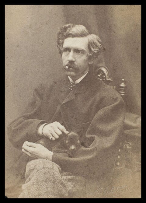 Vintage Portrait of Man With Small Puppy