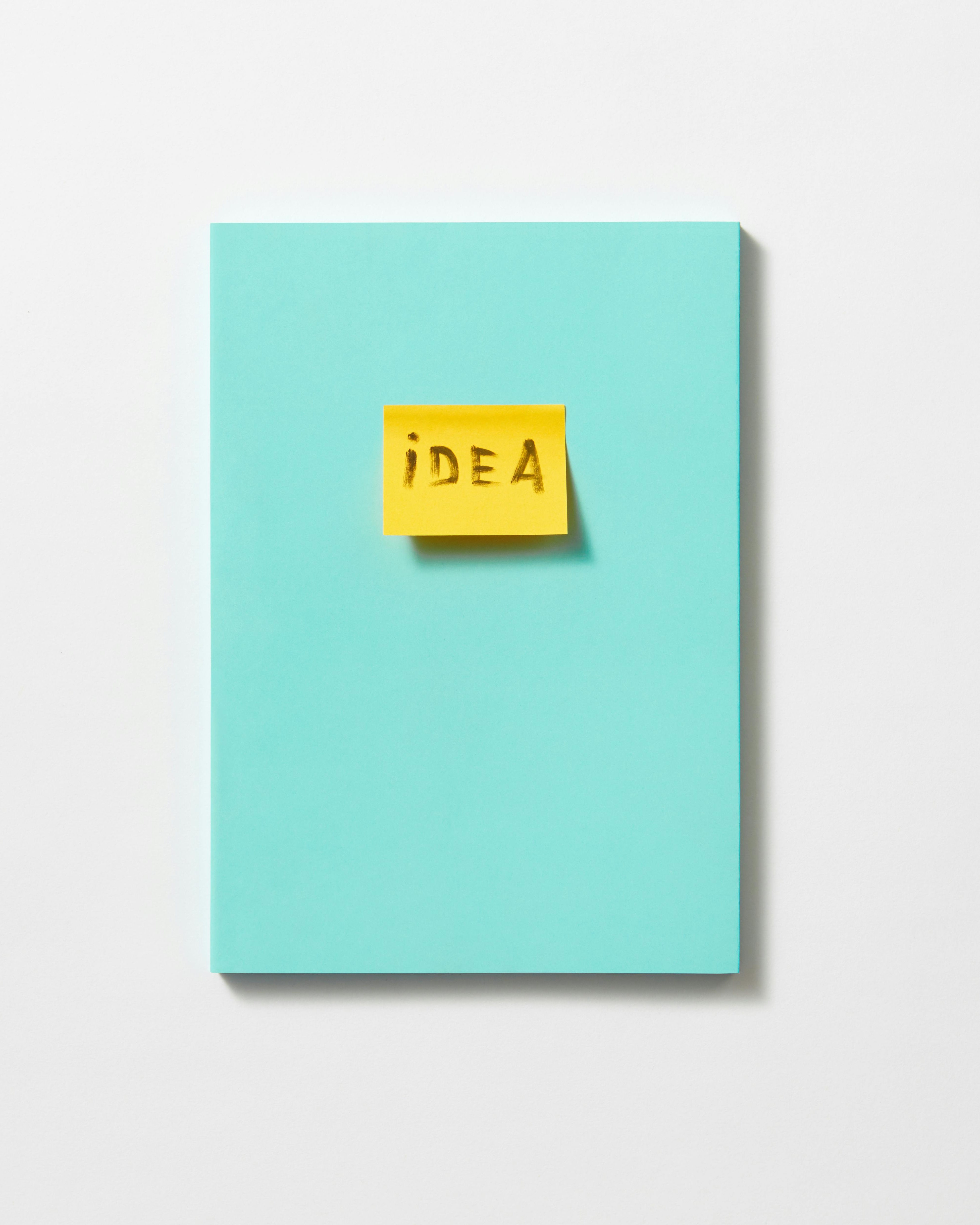 Turquoise Notebook With Idea Sticky Note