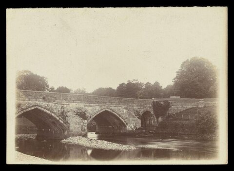 Vintage Stone Arch Bridge Over River