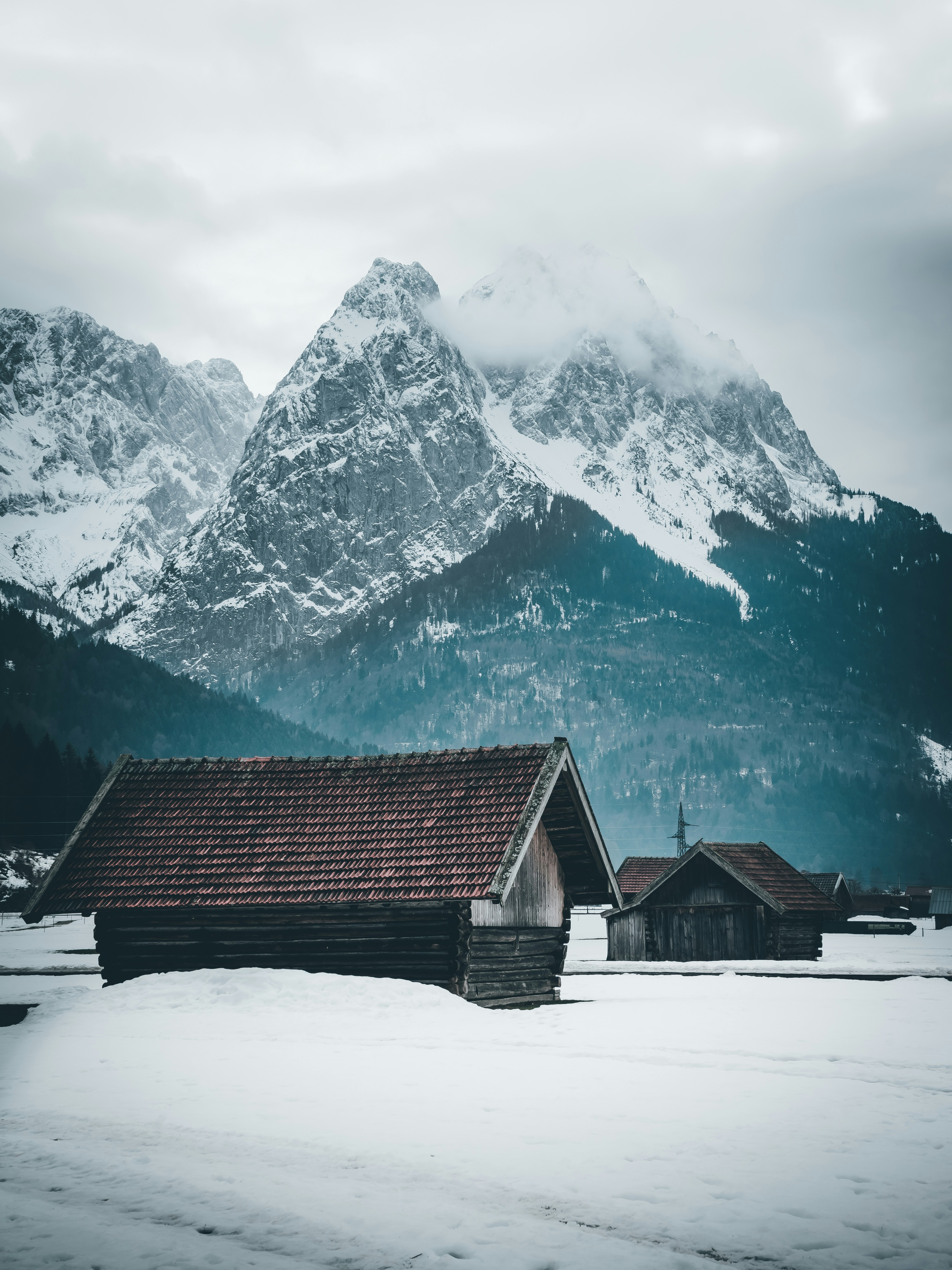 Snowy Mountain Wooden Cabins