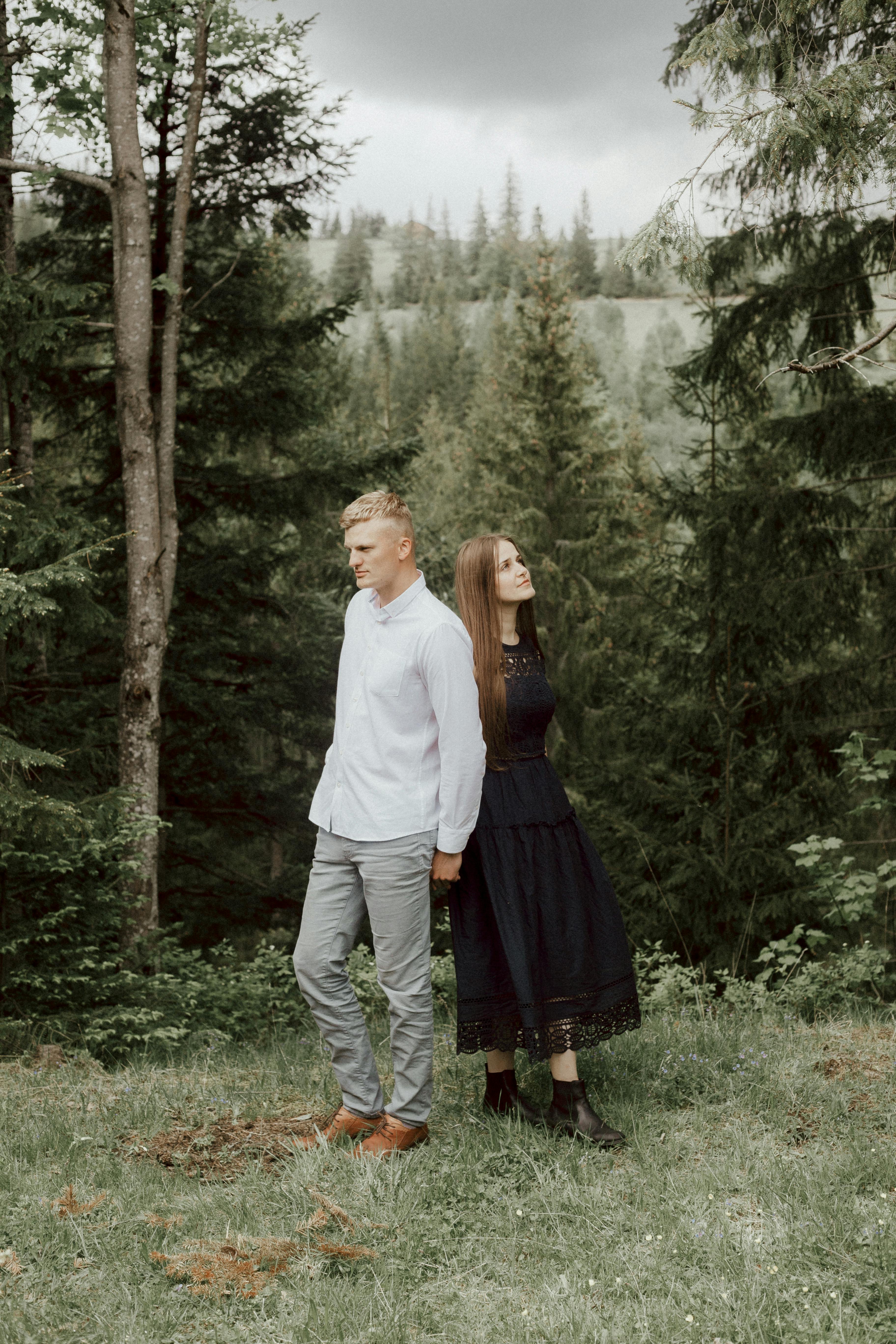 Couple in Mountain Forest Clearing