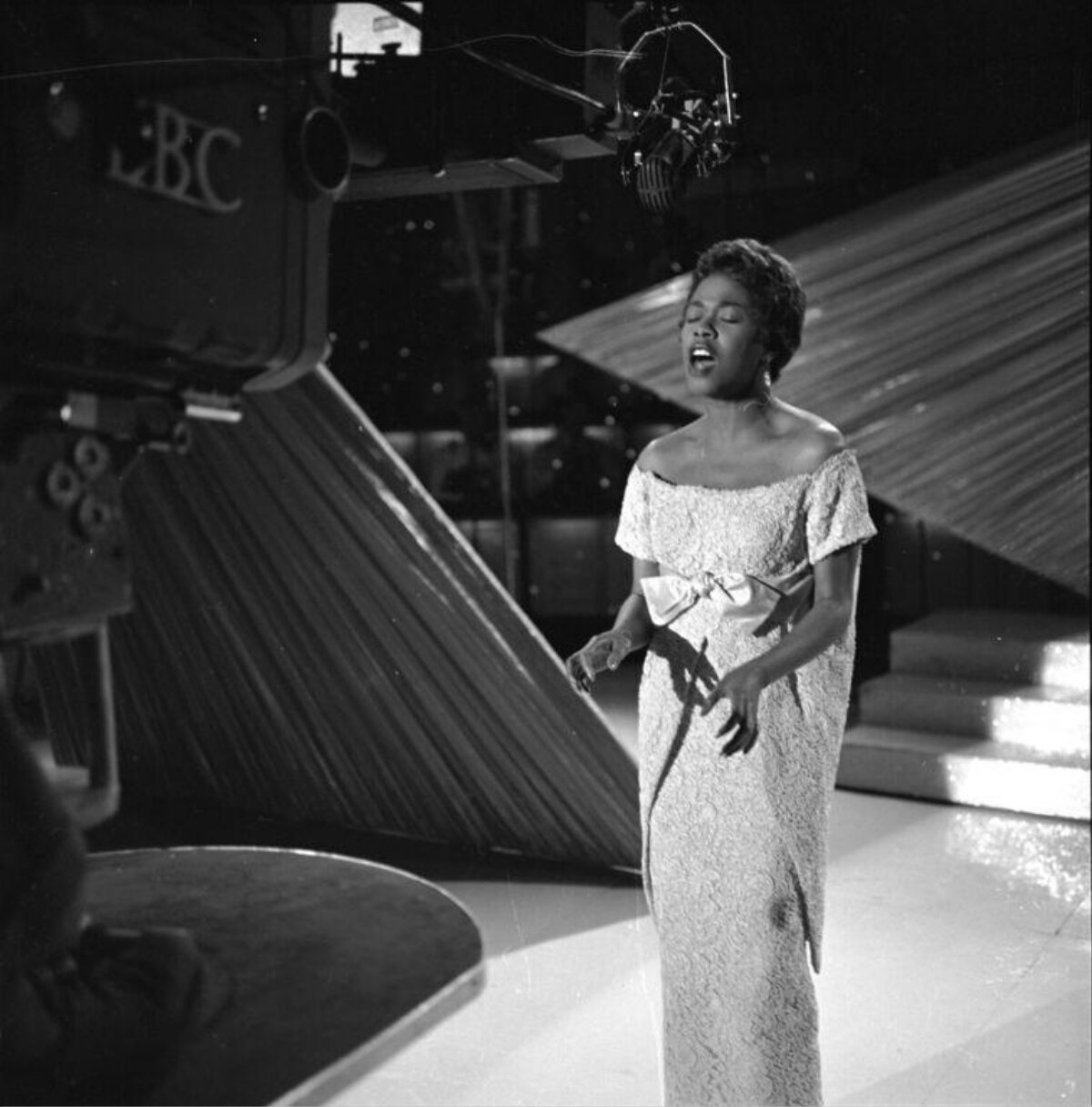 Female Singer Performing on TV Studio Stage