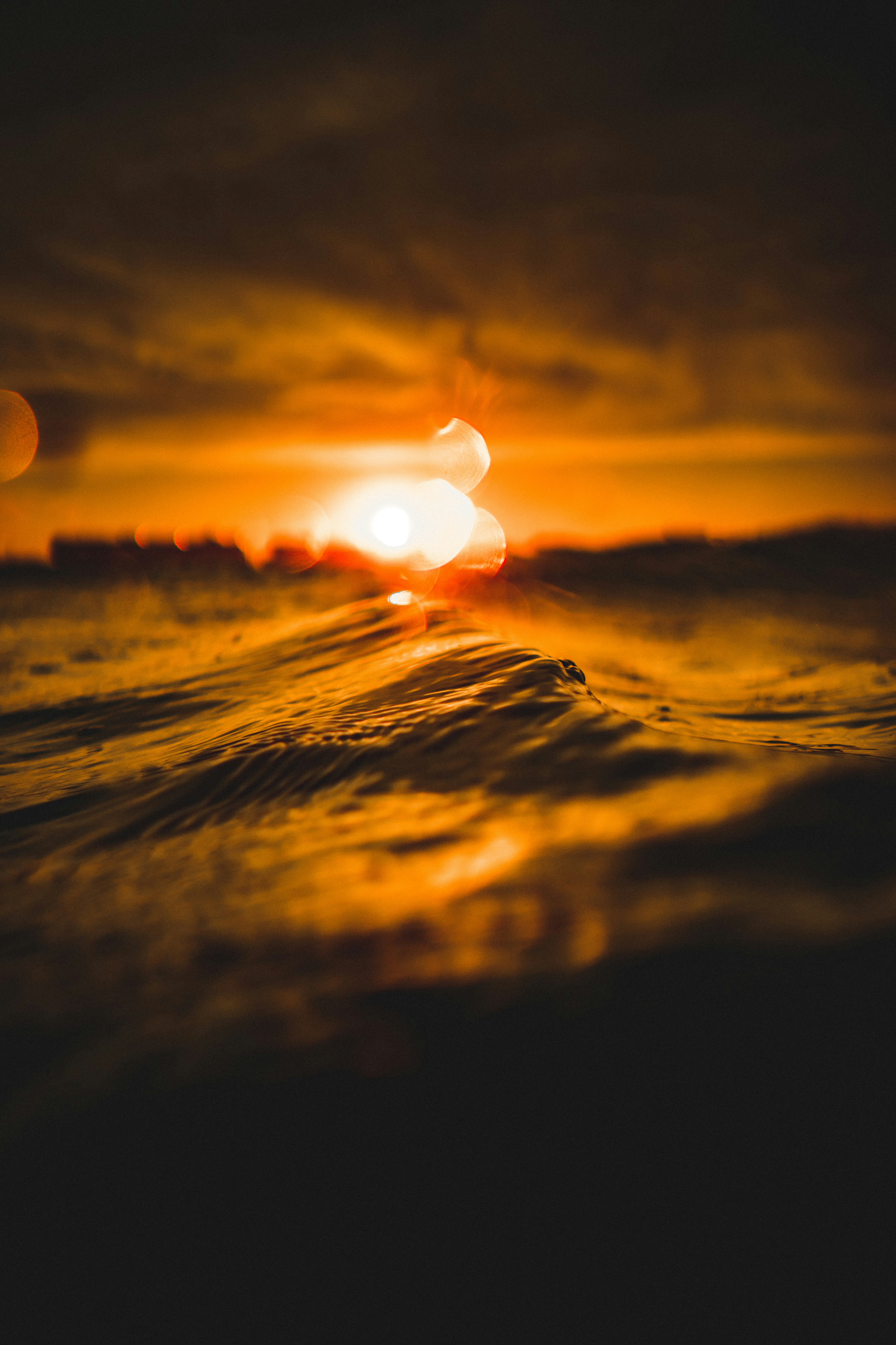 Sunset Over Ocean Waves