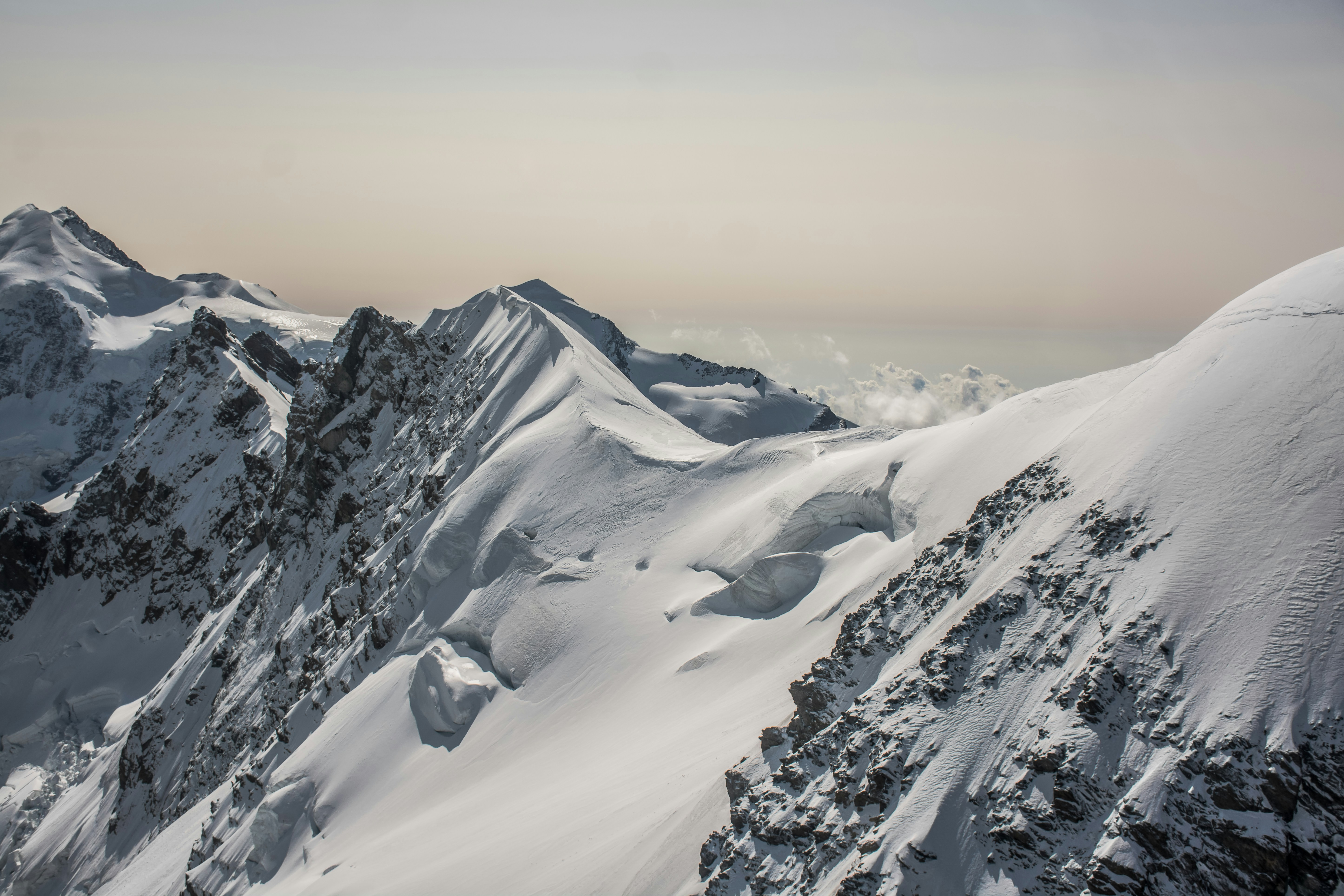 Snow-Covered Alpine Mountain Ridges