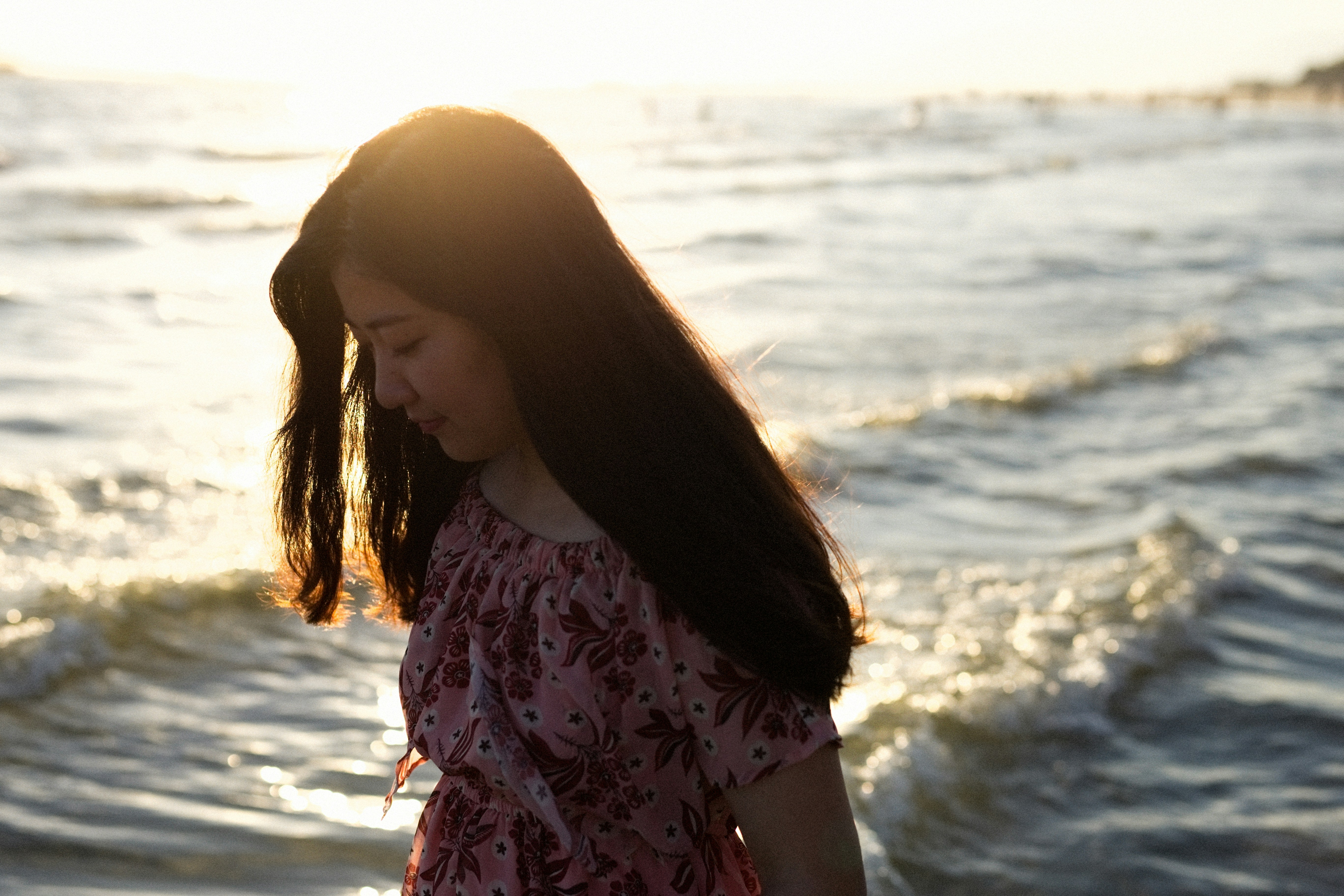 Woman at Seaside During Sunset