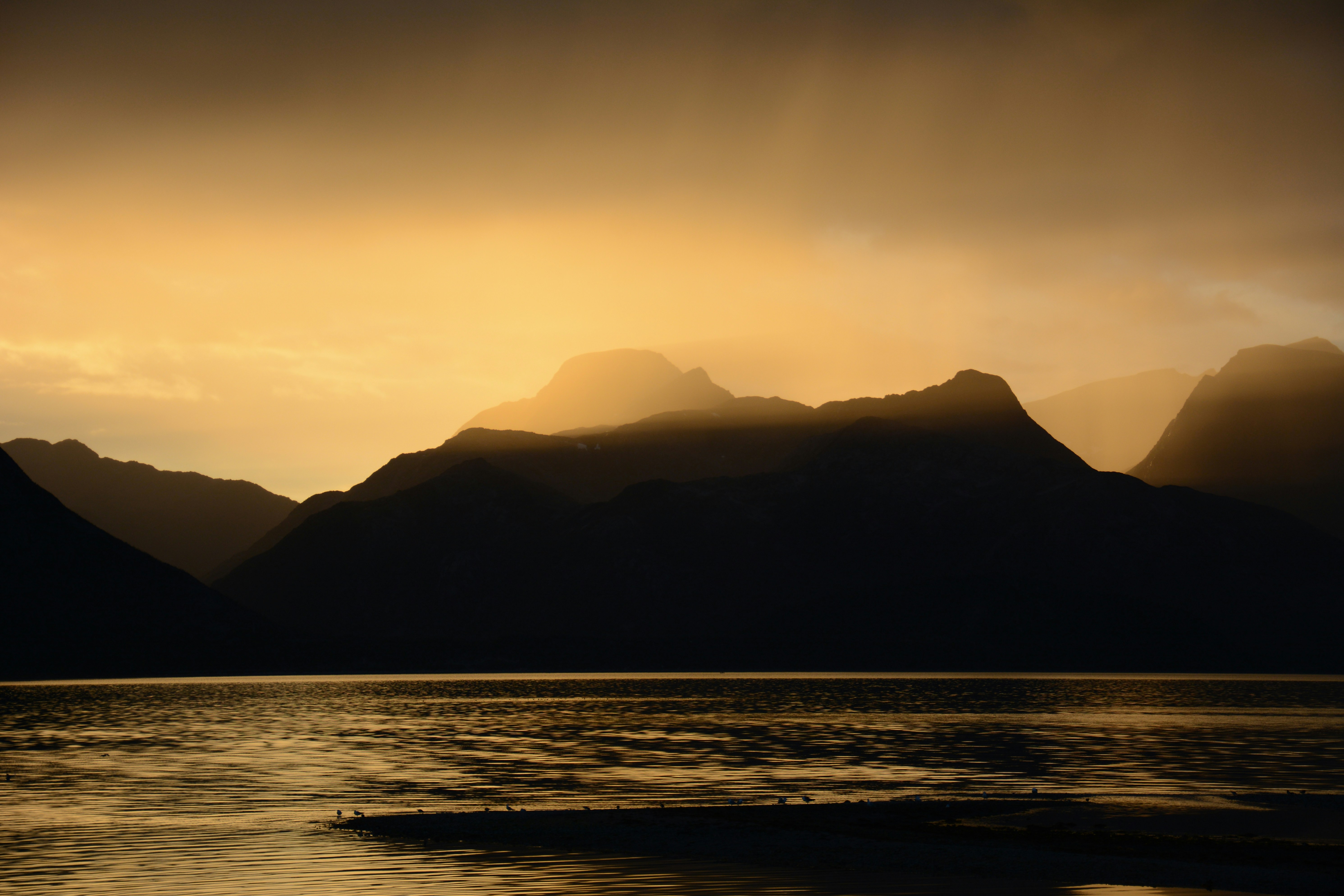 Golden Sunset Over Mountain Lake