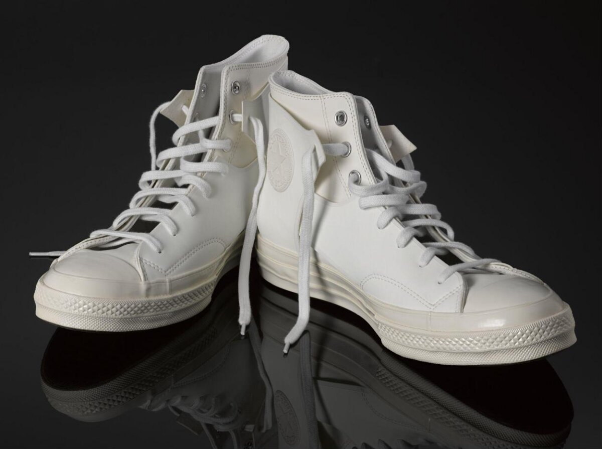 Pair of White High Top Sneakers