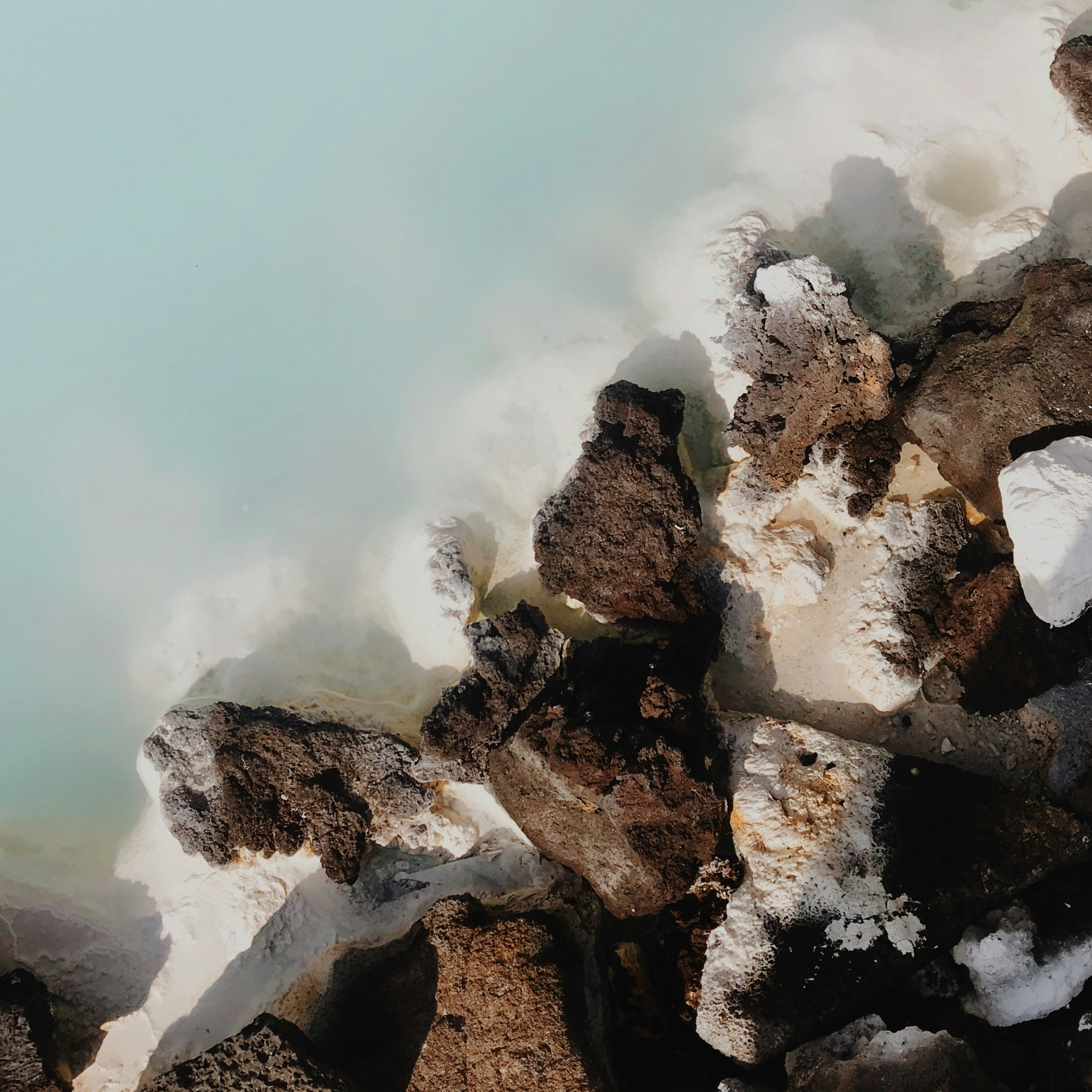 Turquoise Mineral Pool Rocky Edge