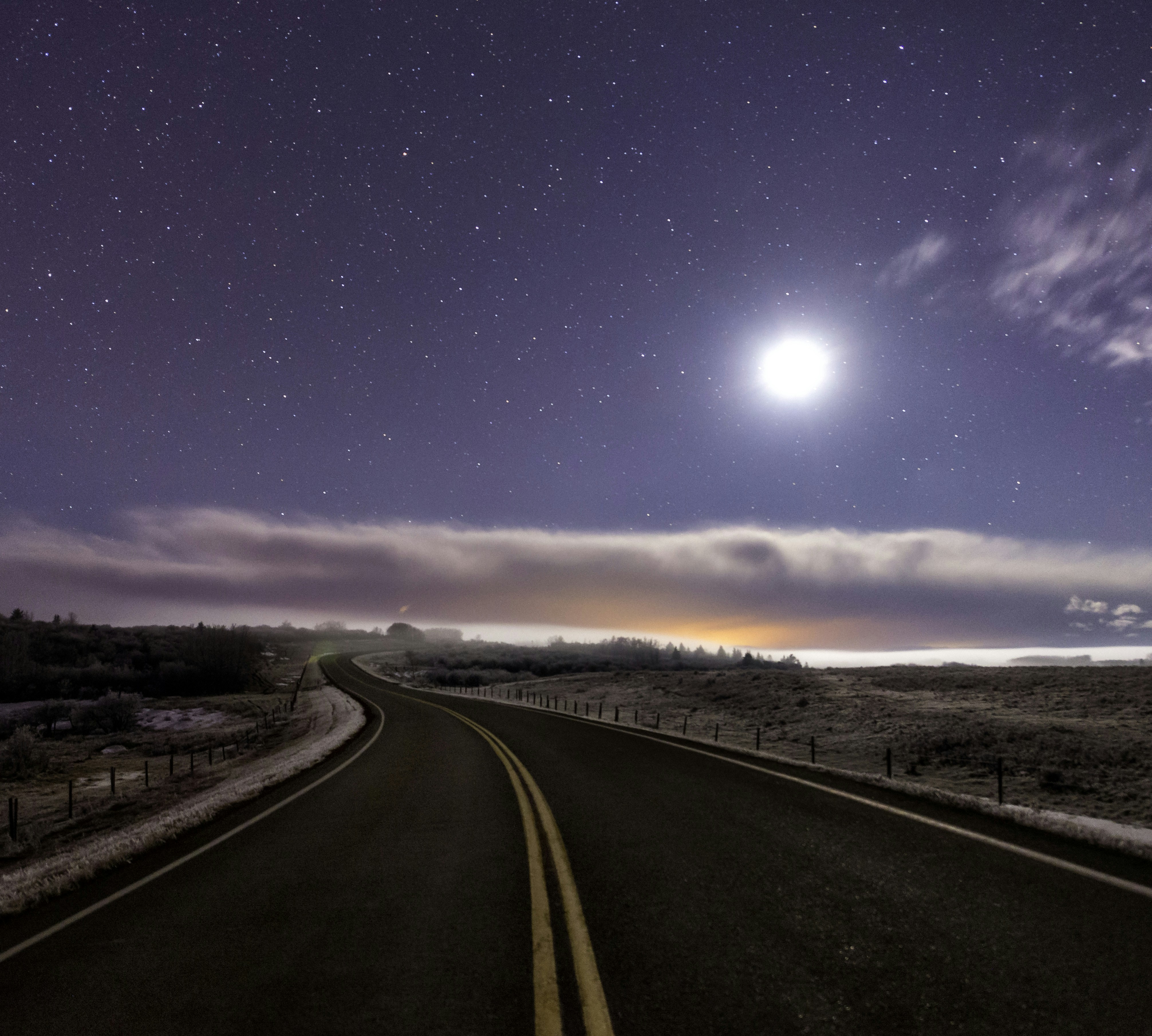Moonlit Winding Road at Night