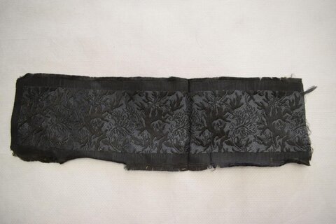 Black Patterned Woven Fabric Fragment