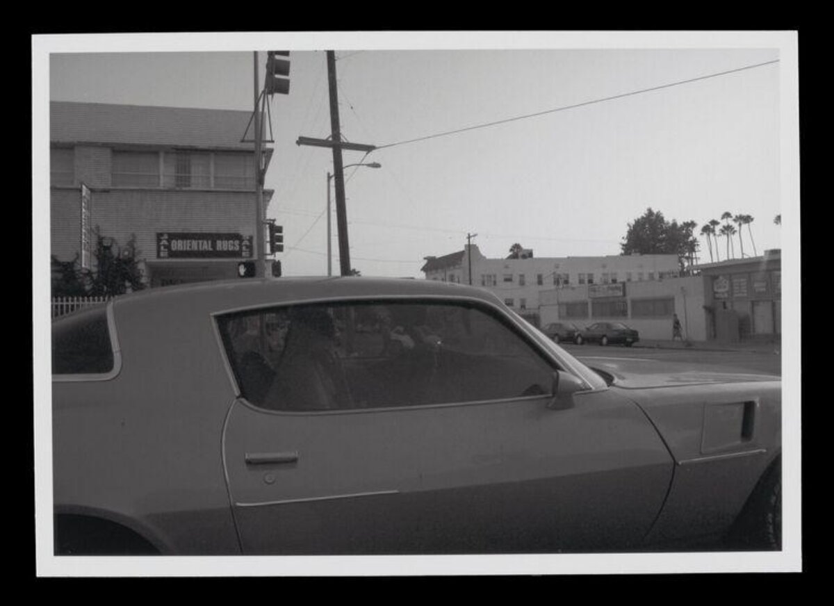 Vintage Car At Urban Intersection