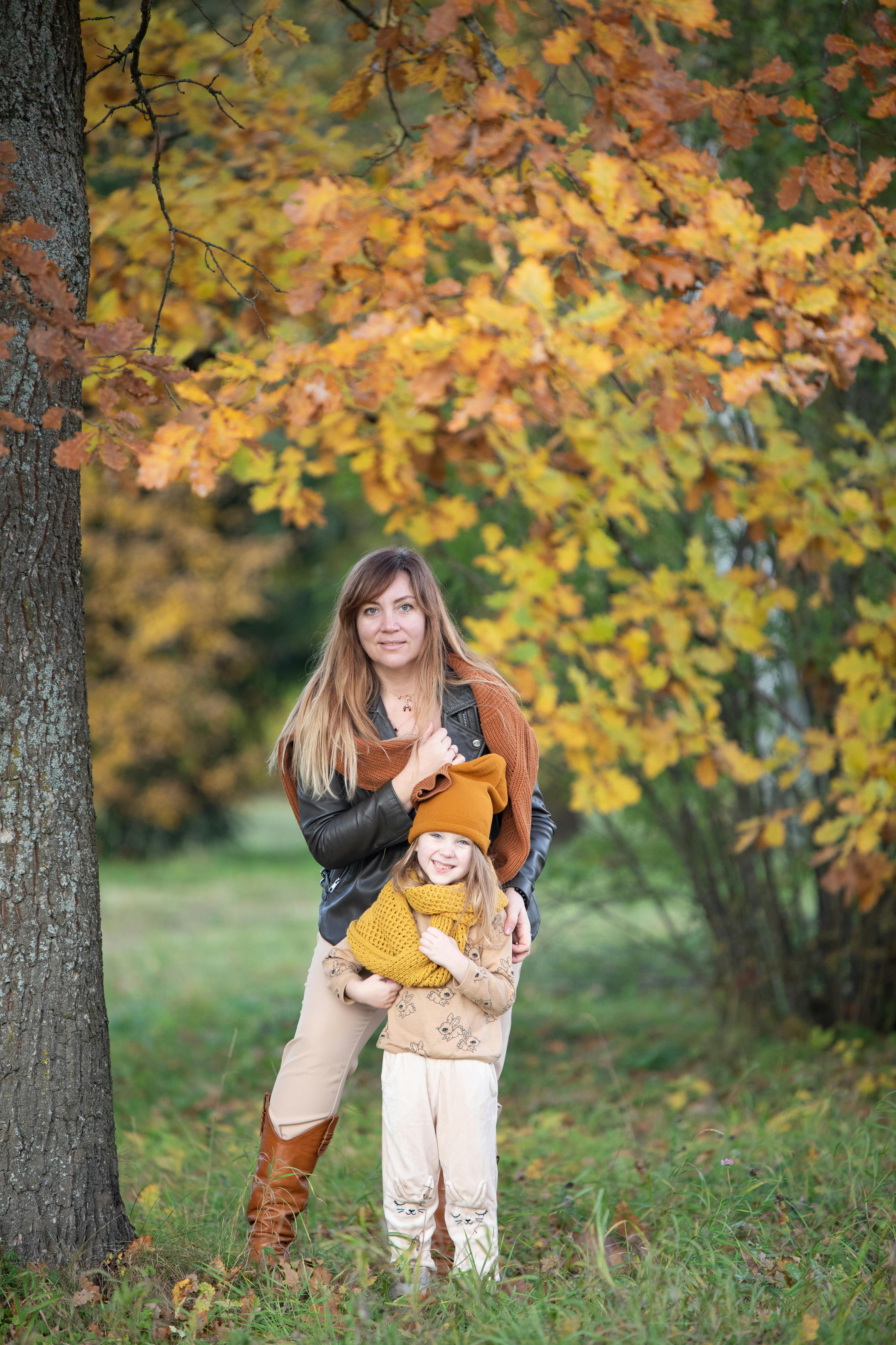Mother and Daughter in Autumn Park