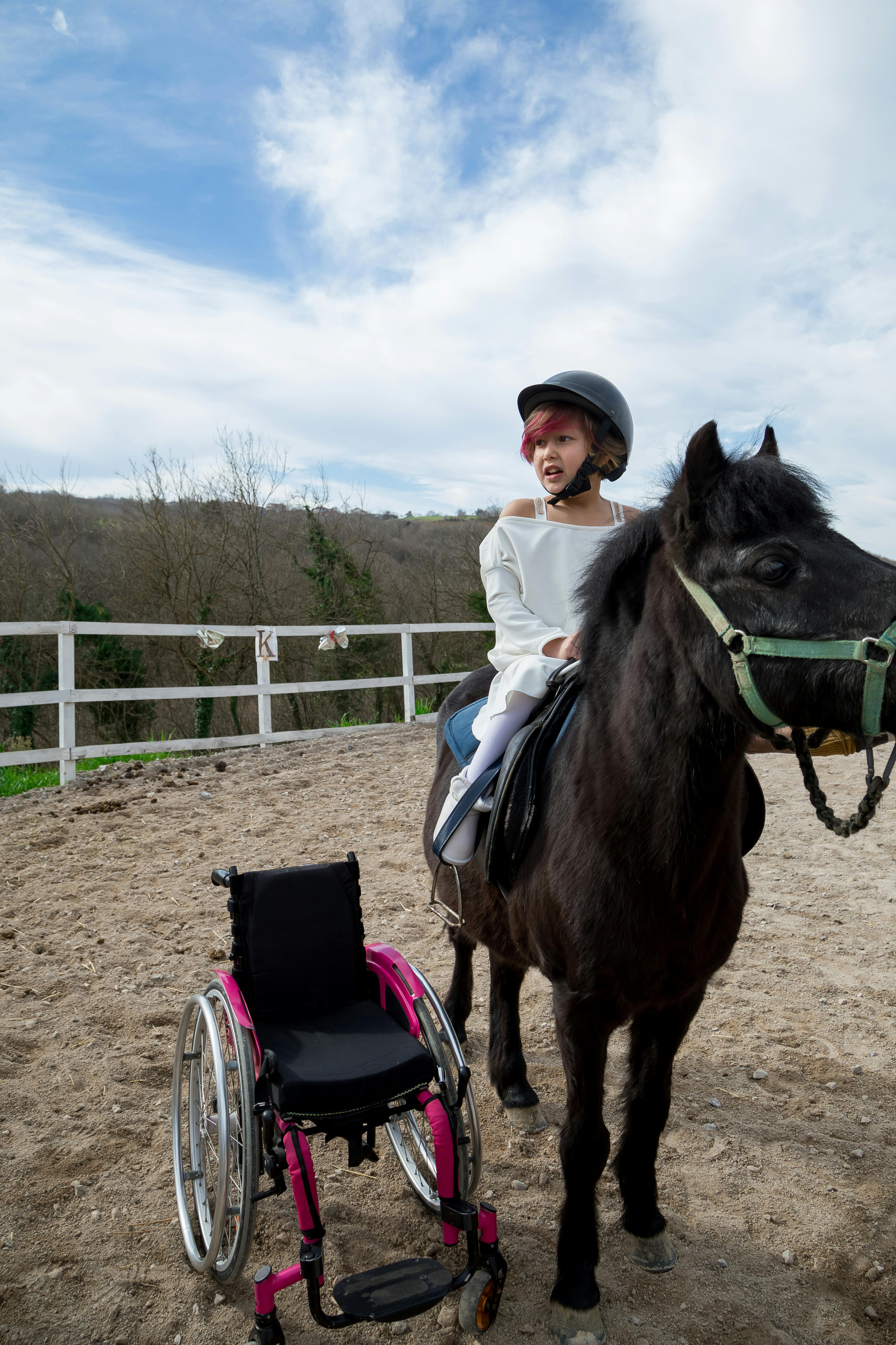 Disabled Child Enjoying Horse Riding