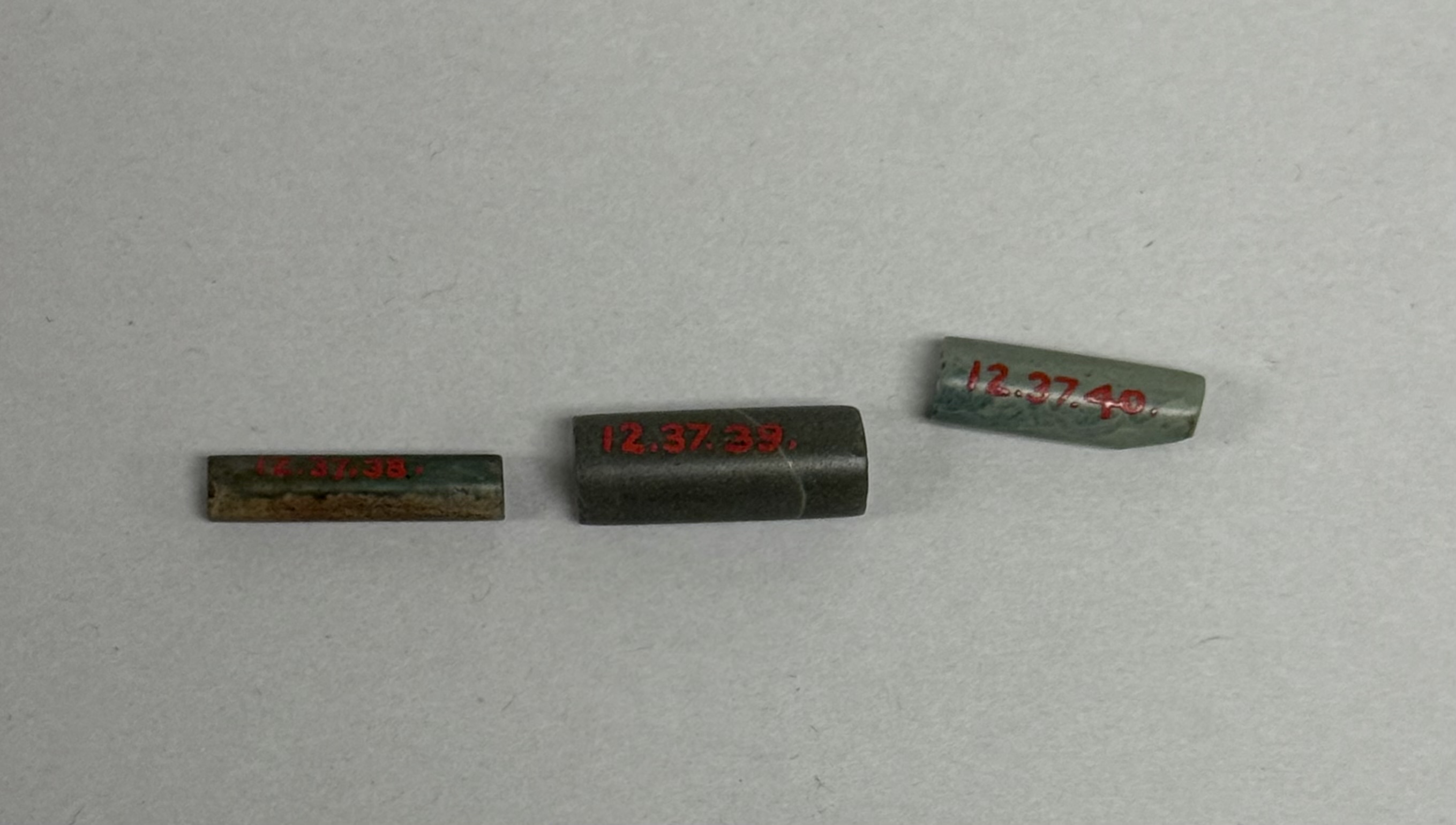 Three Cataloged Stone Tube Artifacts