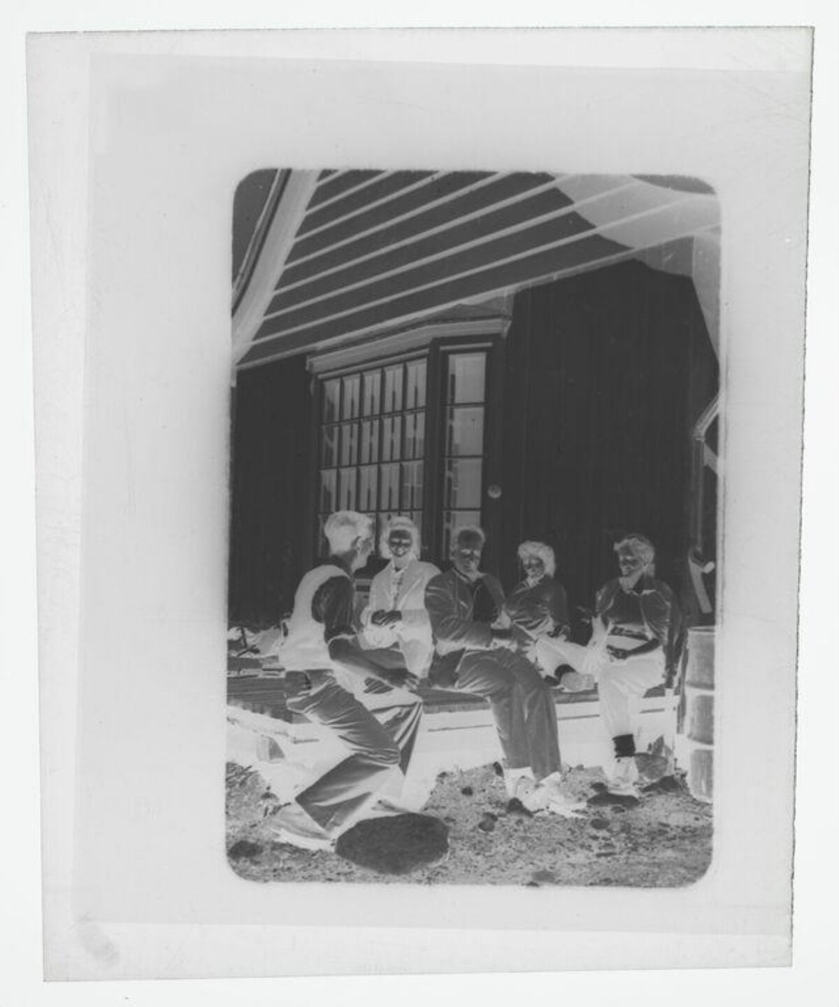 Five People Gathering on Porch