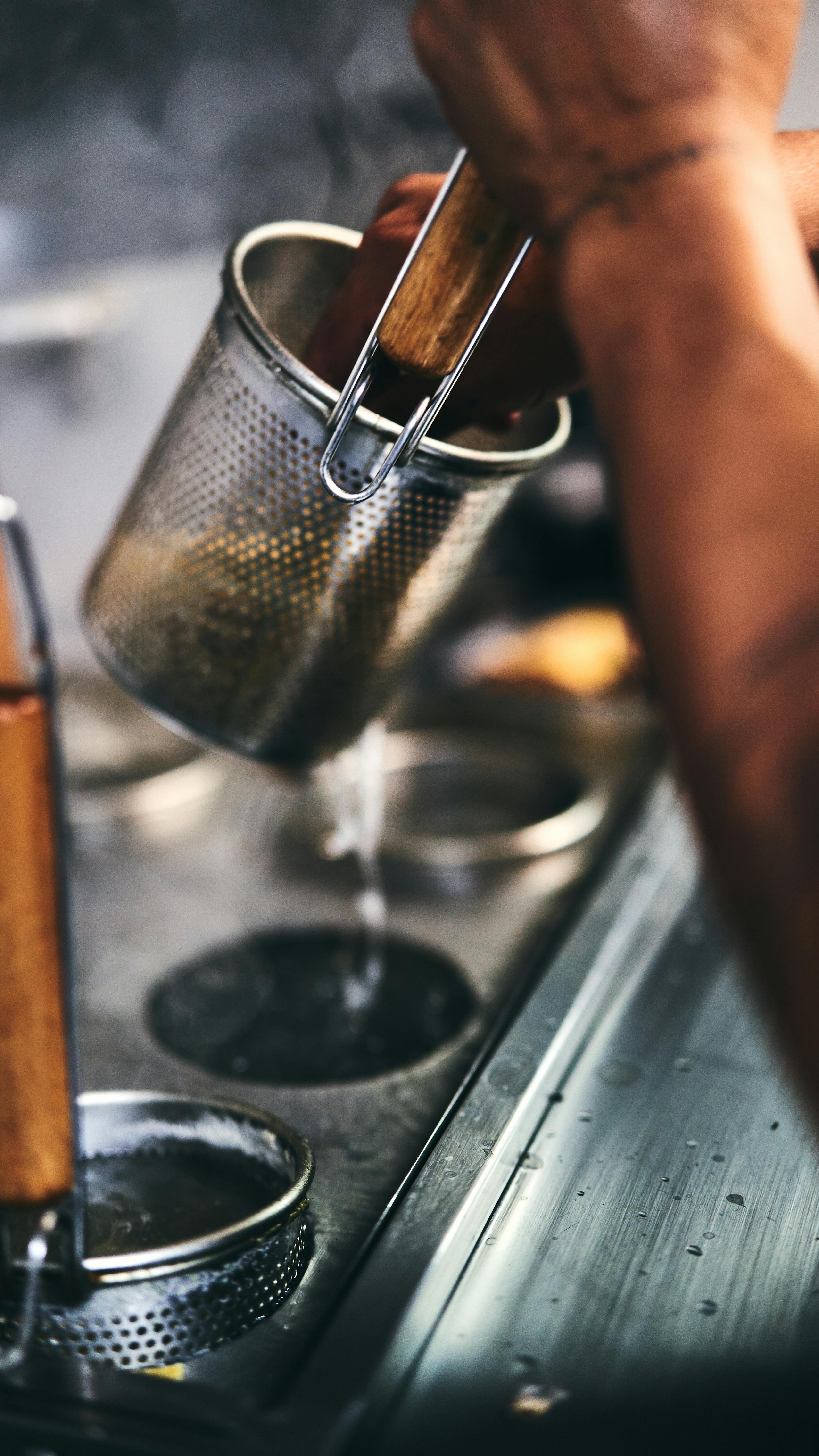 Pouring Freshly Brewed Tea