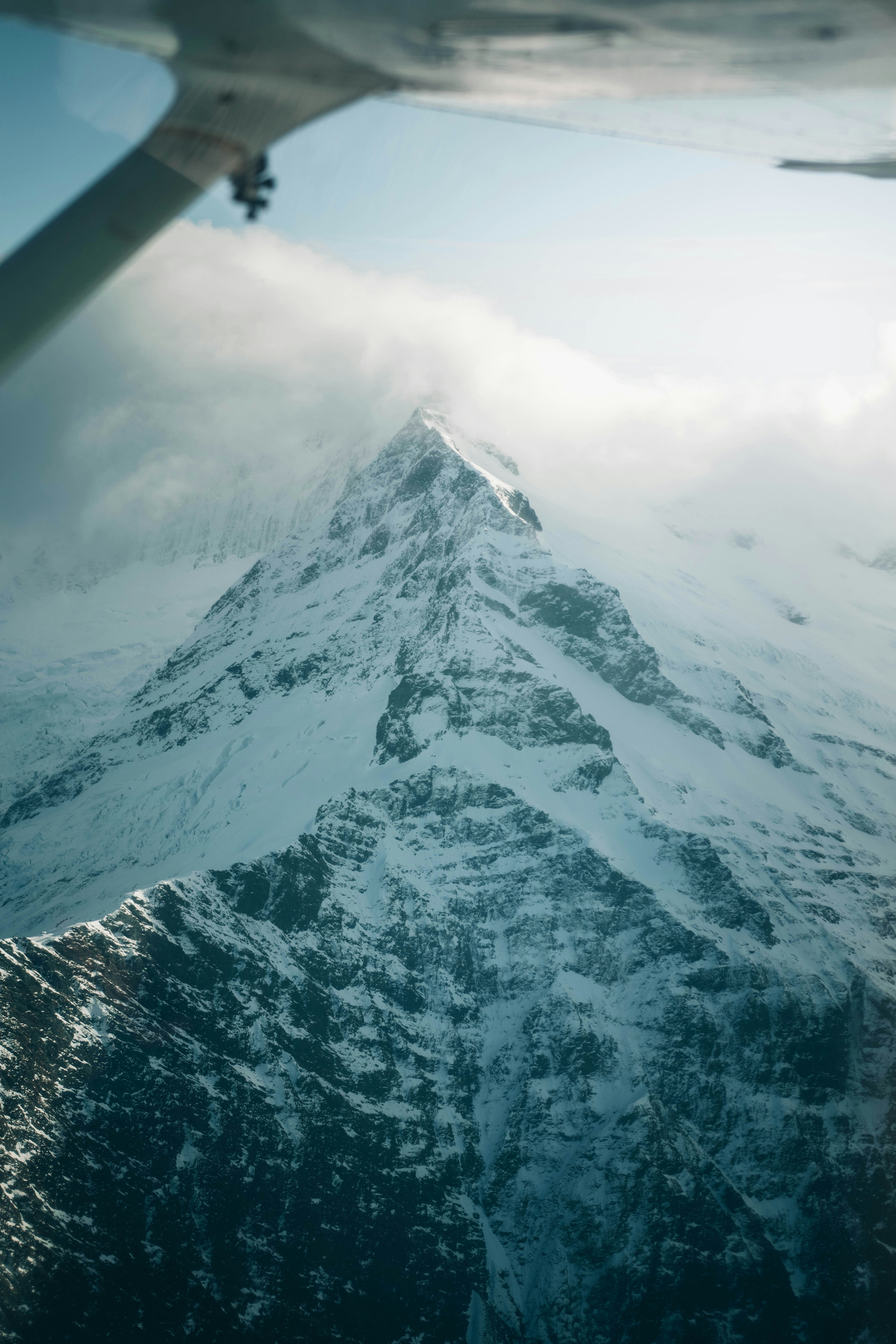 Snow Capped Peak Seen From Plane