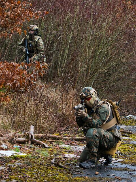 Two Tactical Airsoft Players in Woodland