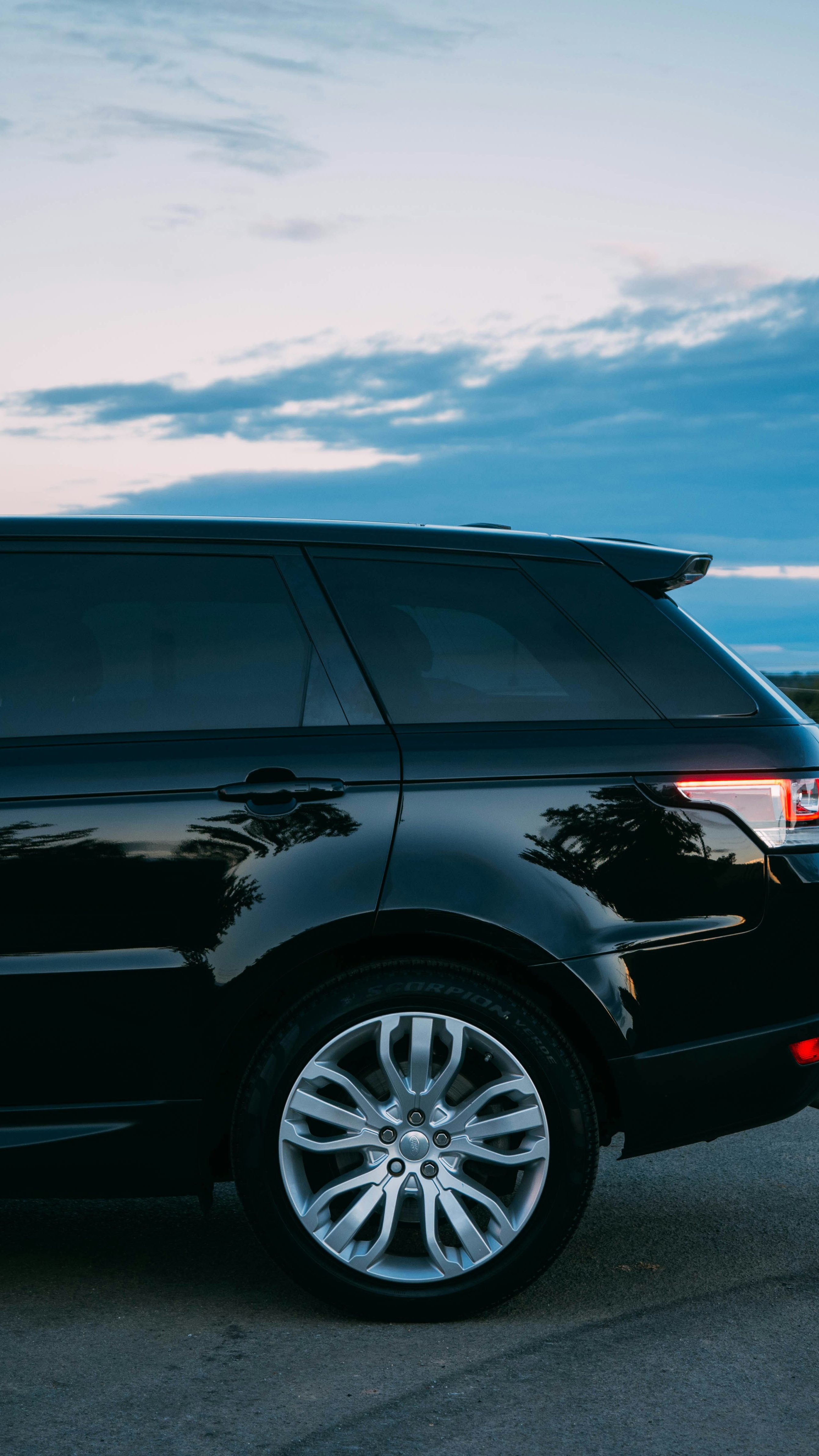 Black SUV Parked at Dusk