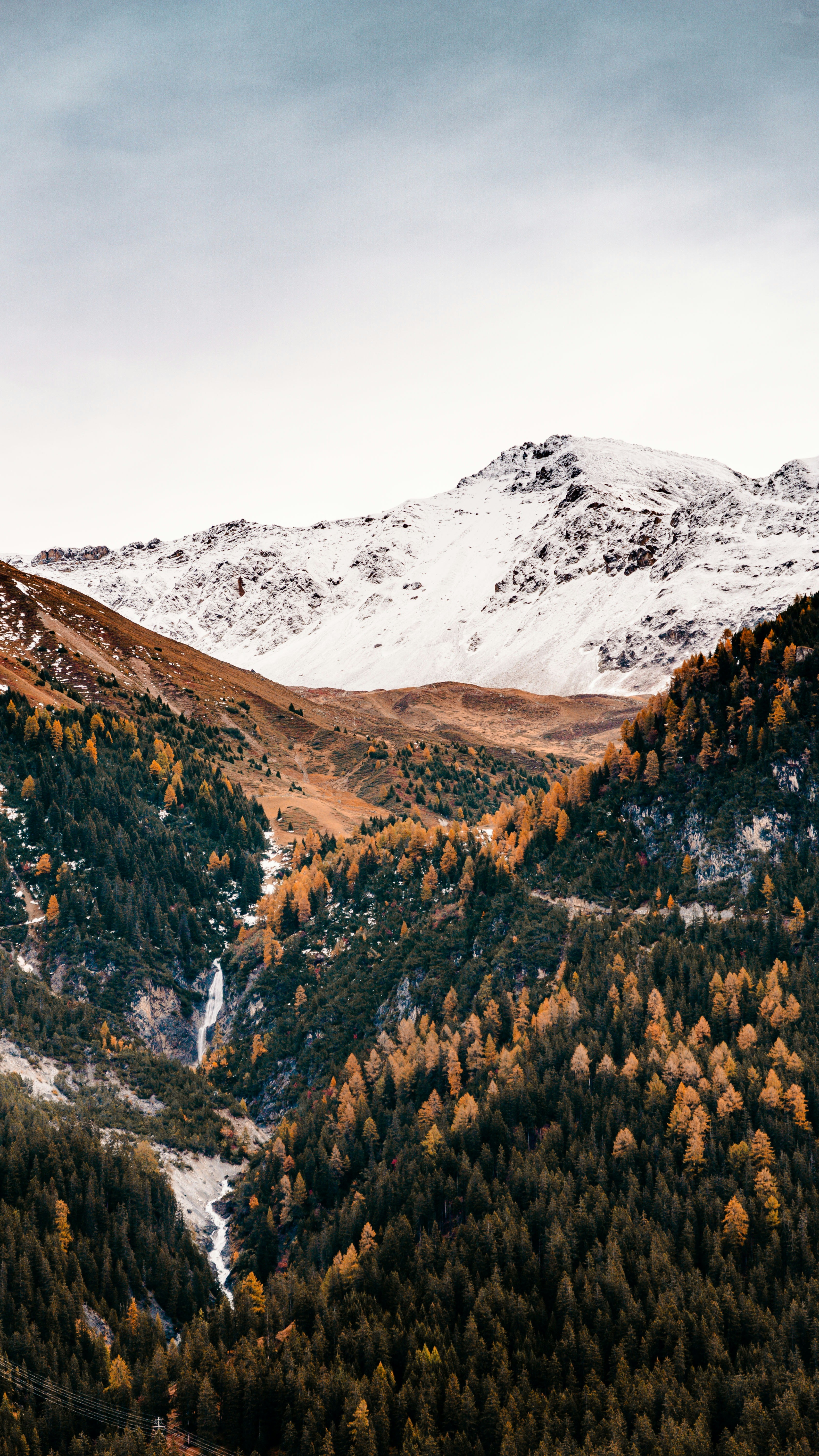 Autumn Mountain Valley with Snow-capped Peak