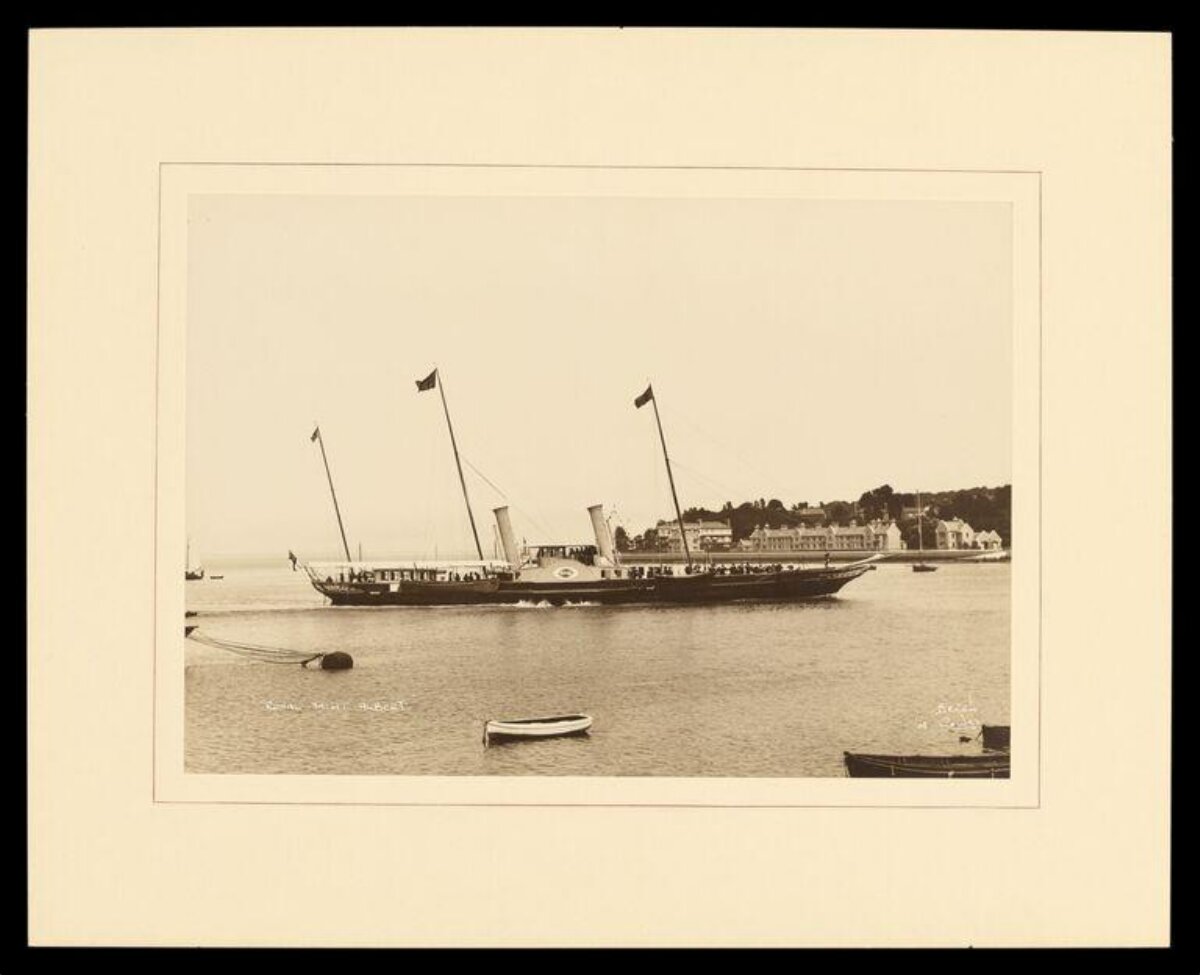 Vintage Steam Yacht in Coastal Harbor