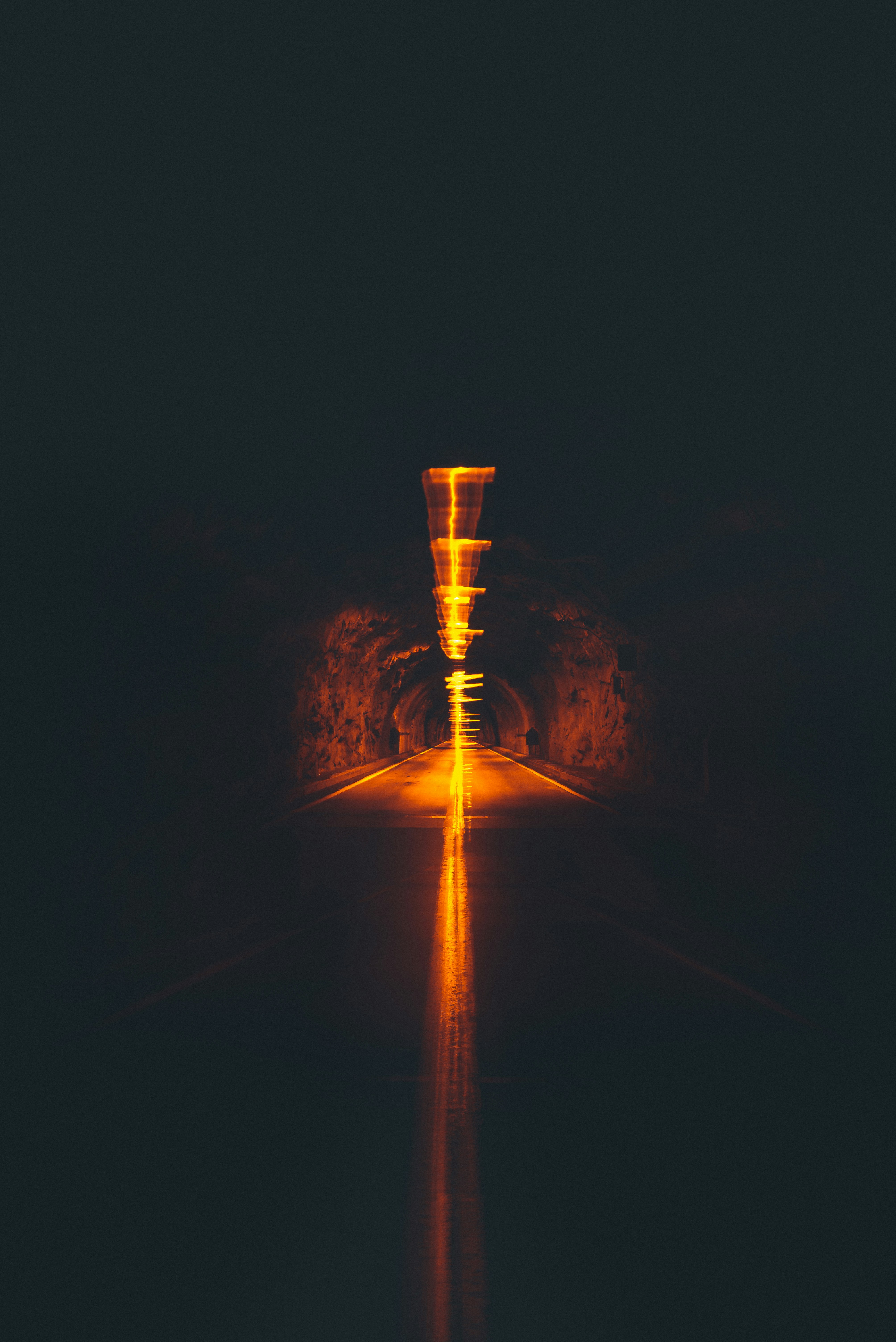 Empty Night Tunnel with Orange Lights