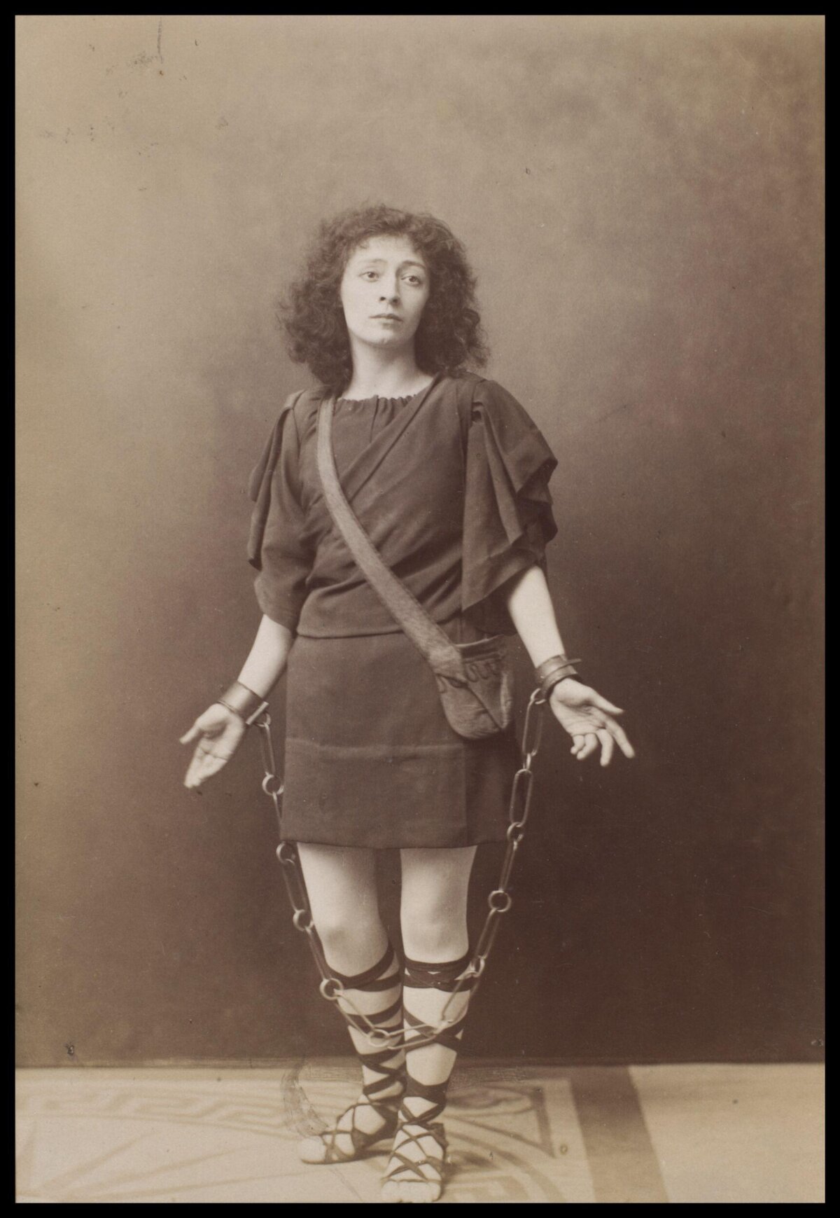 Vintage Portrait of Woman in Chains Costume