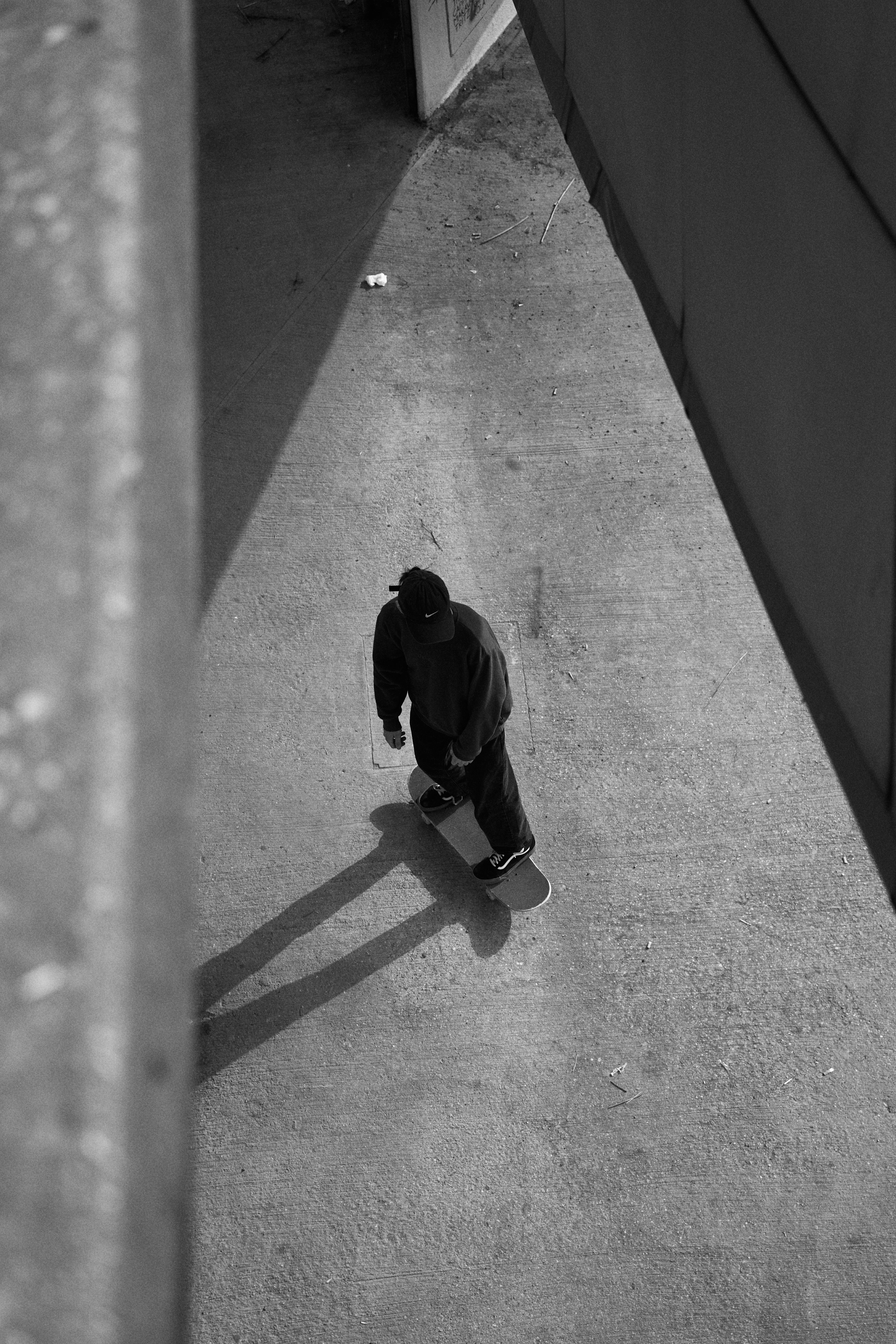 Skateboarder in Urban Alley