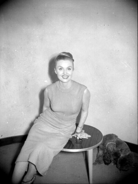Vintage Portrait Of Smiling Woman With Dog