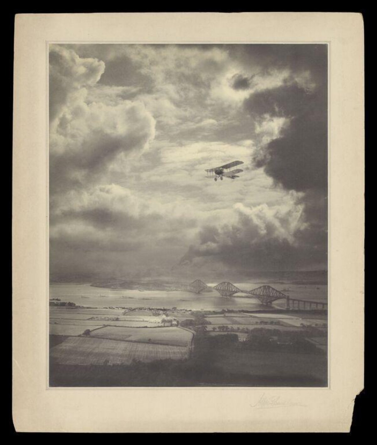 Vintage Biplane Over Forth Bridge