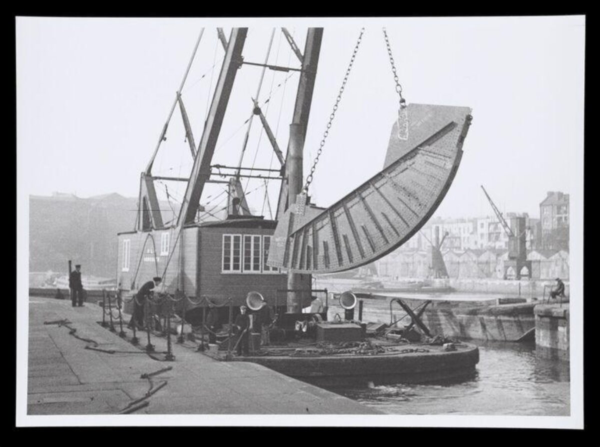Crane Lifting Propeller at Dock